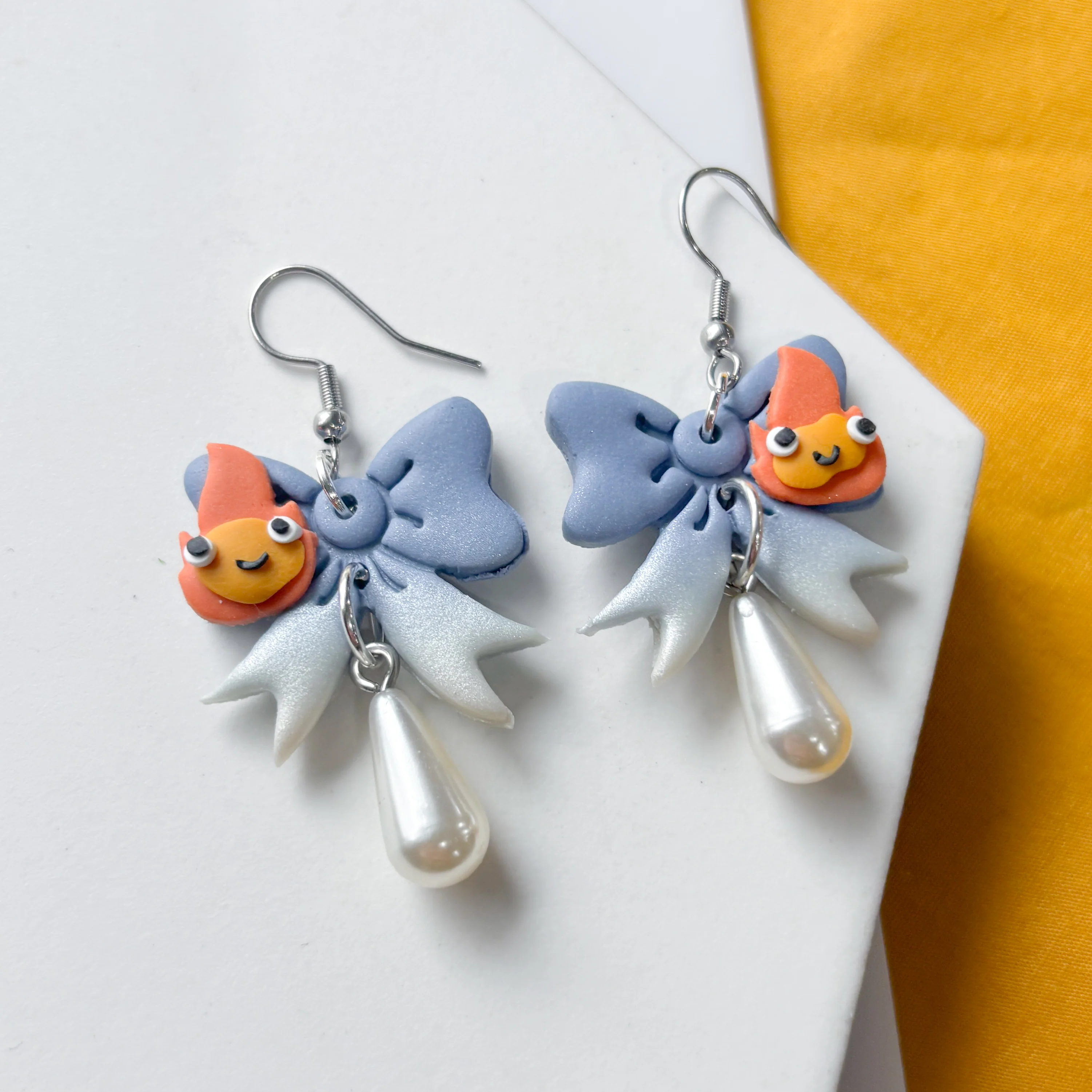 FLAME SPIRIT SOPHIE BOW EARRINGS - Image 1