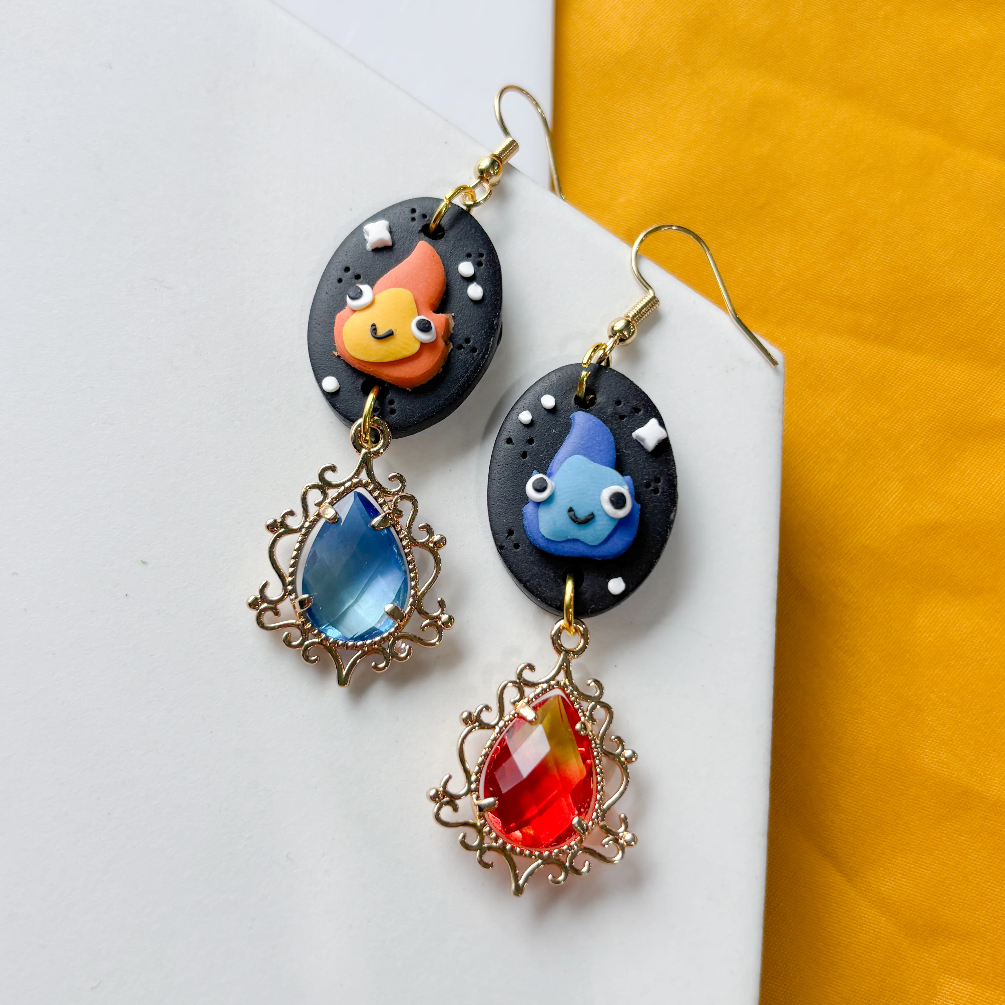 MISMATCHED FLAME SPIRIT OVAL EARRINGS - Image 2