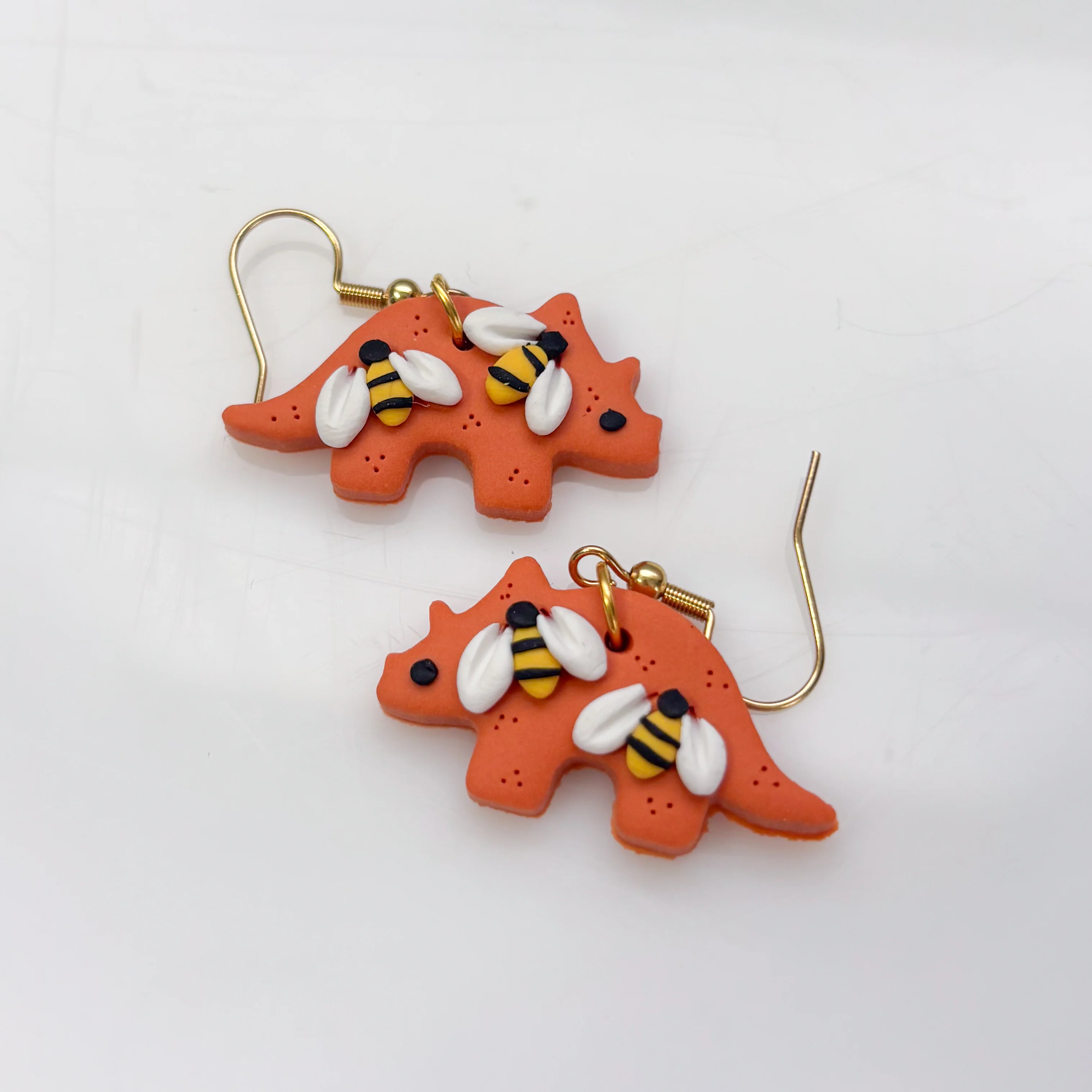 ORANGE BEE DINO EARRINGS (TRICERATOPS) - Image 2