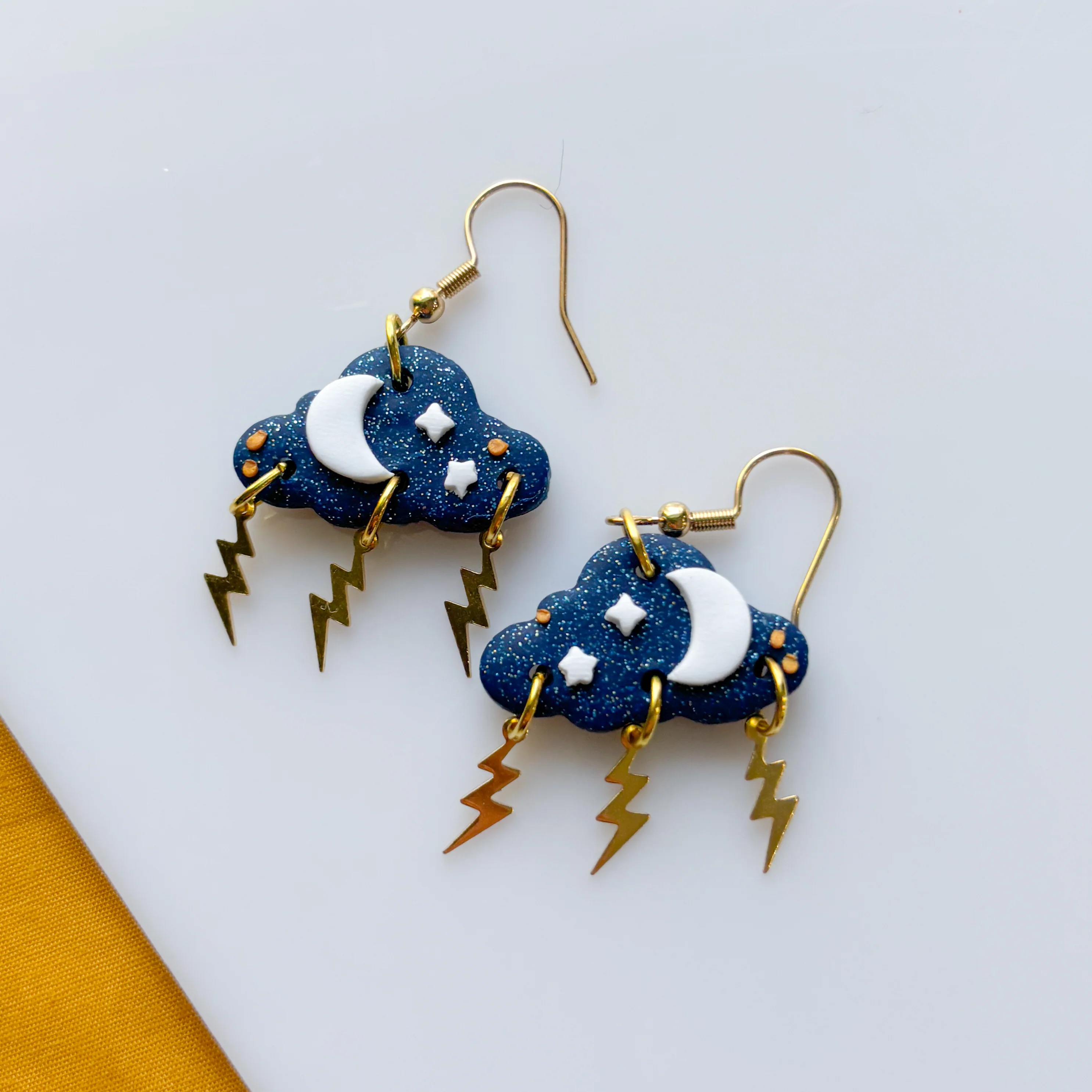 DARK BLUE STORM CLOUD EARRINGS - Image 1