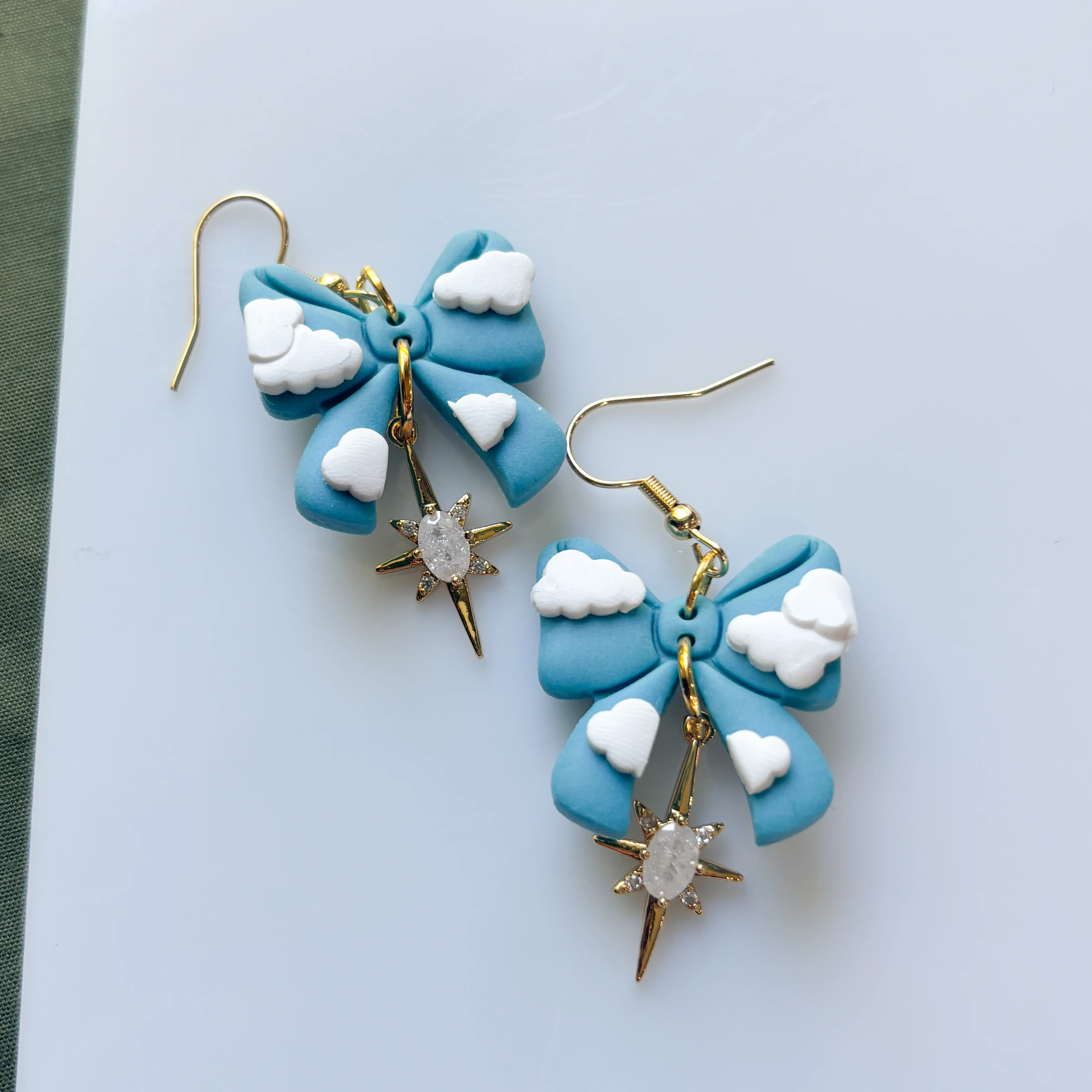 CLOUDY BOW EARRINGS - Image 1