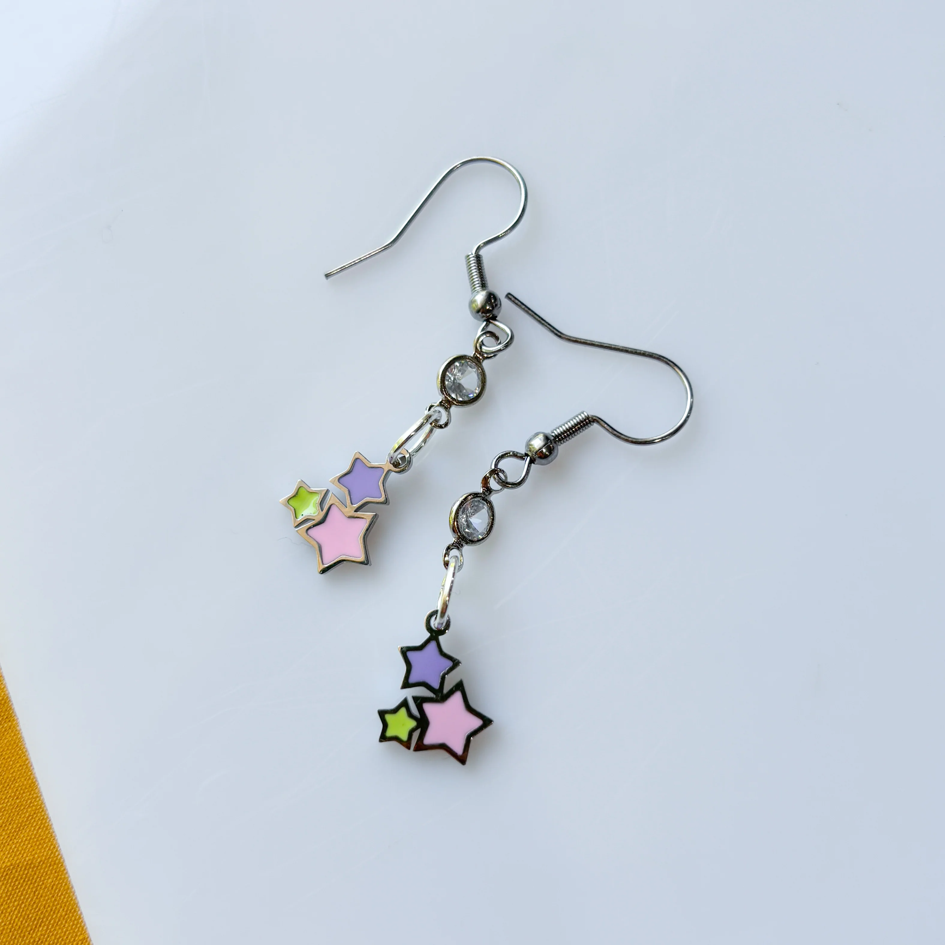 PINK PURPLE YELLOW STAR CHARM EARRINGS - Image 1