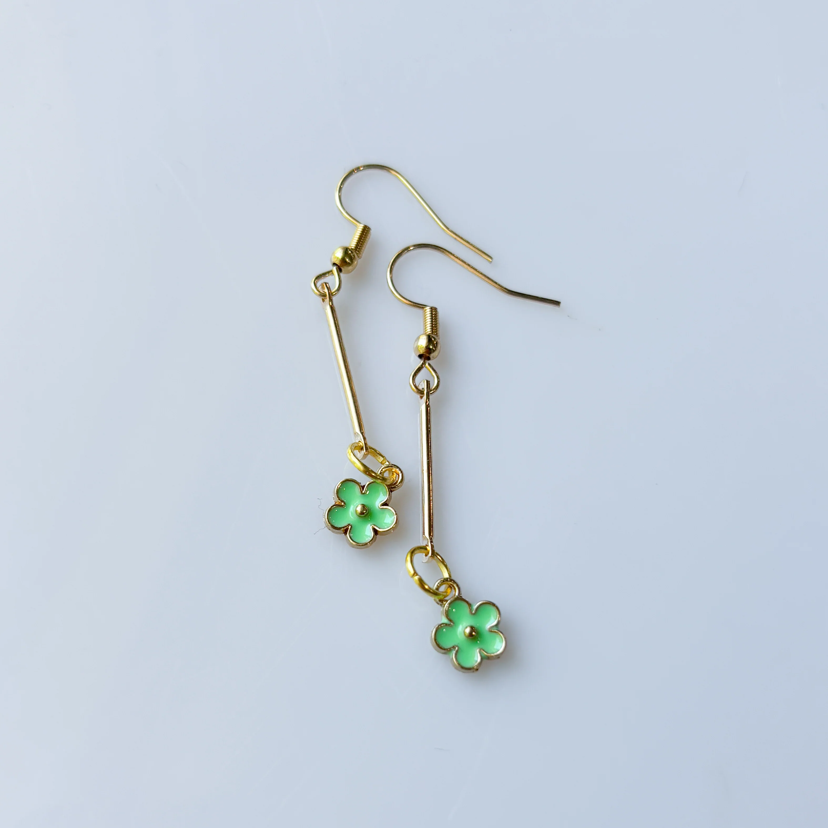 GOLD DROP & LITTLE GREEN FLOWER CHARM EARRINGS - Image 2