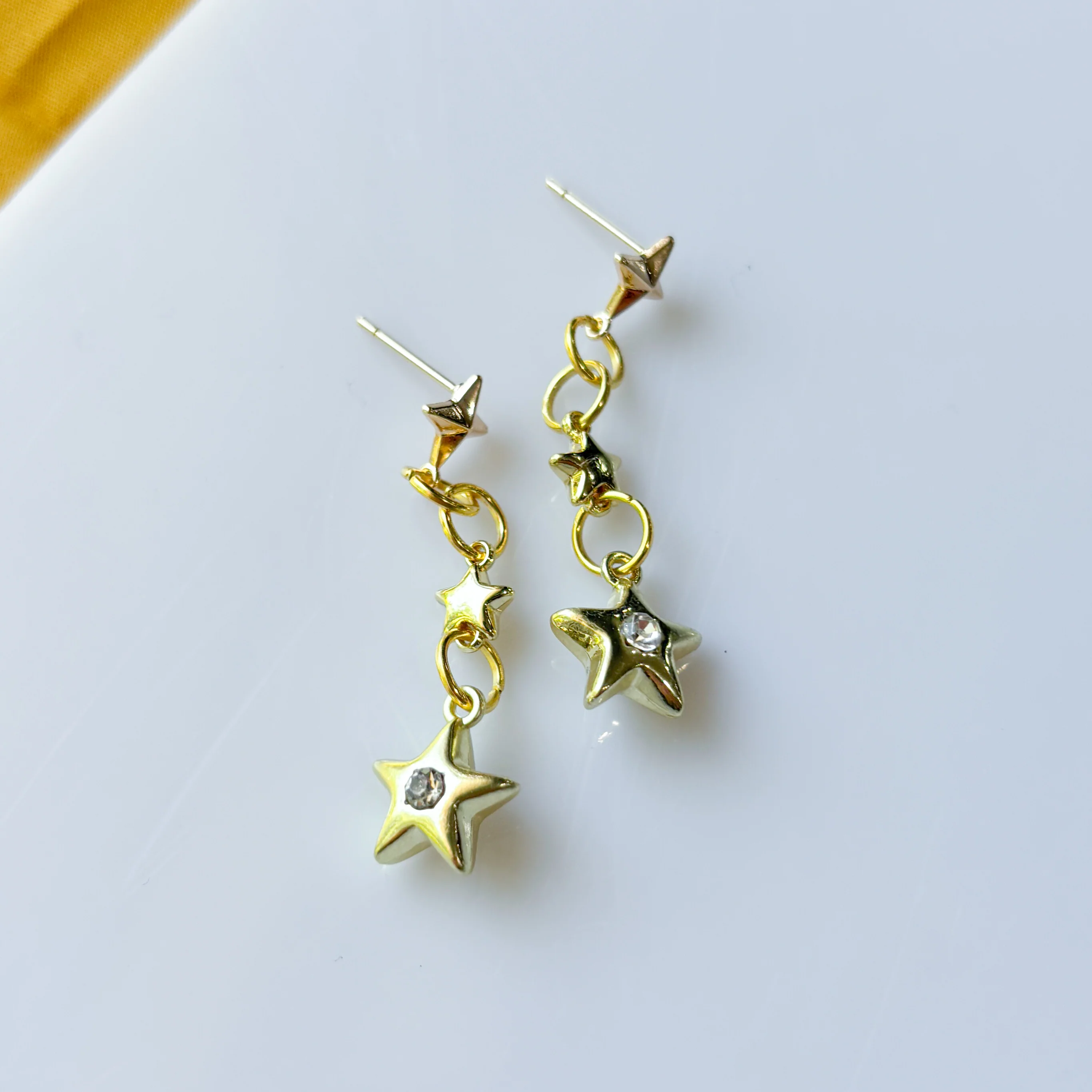 TRIPLE STAR STUD CHARM EARRINGS - Image 2