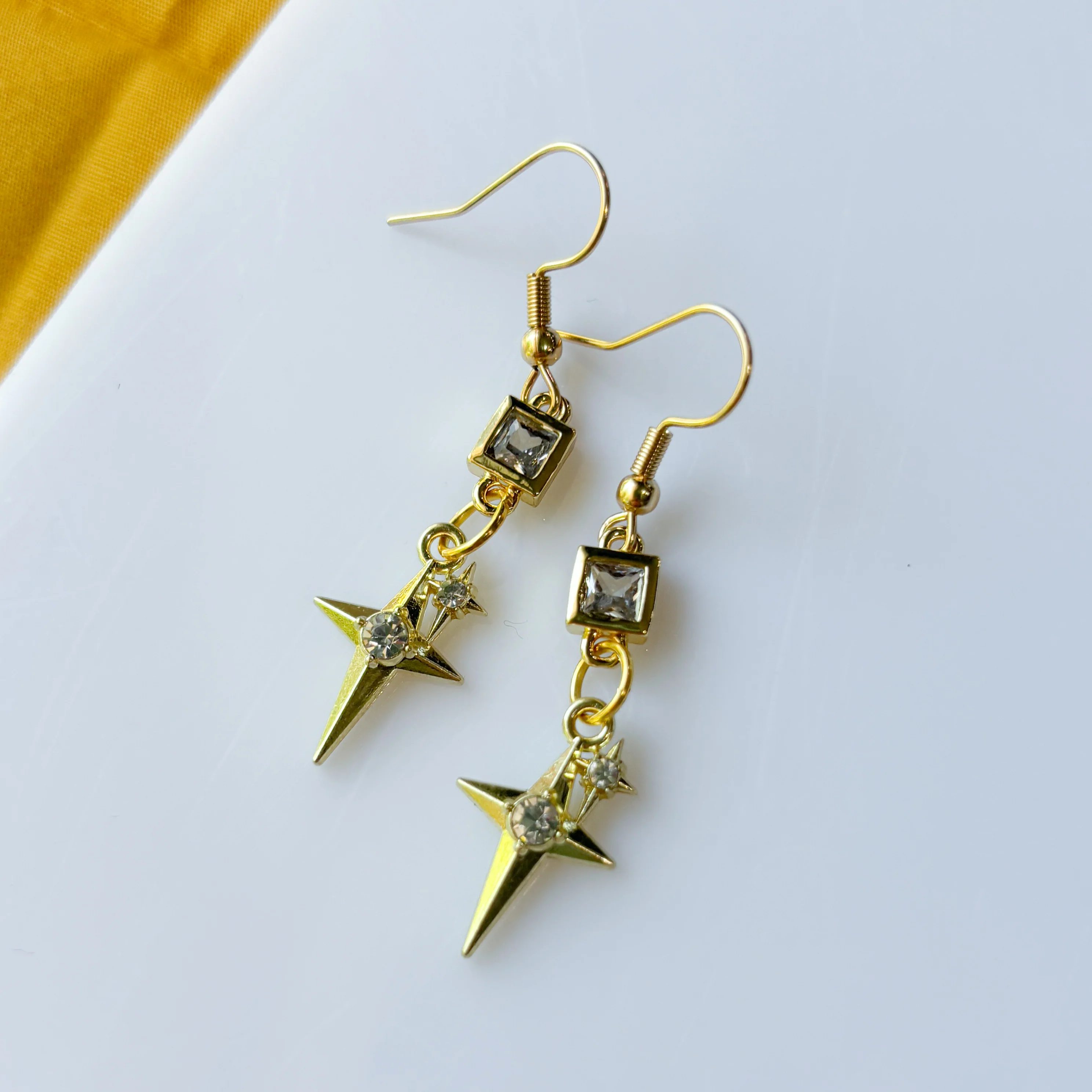 SQUARE CRYSTAL & DOUBLED STAR GOLD CHARM EARRINGS - Image 2
