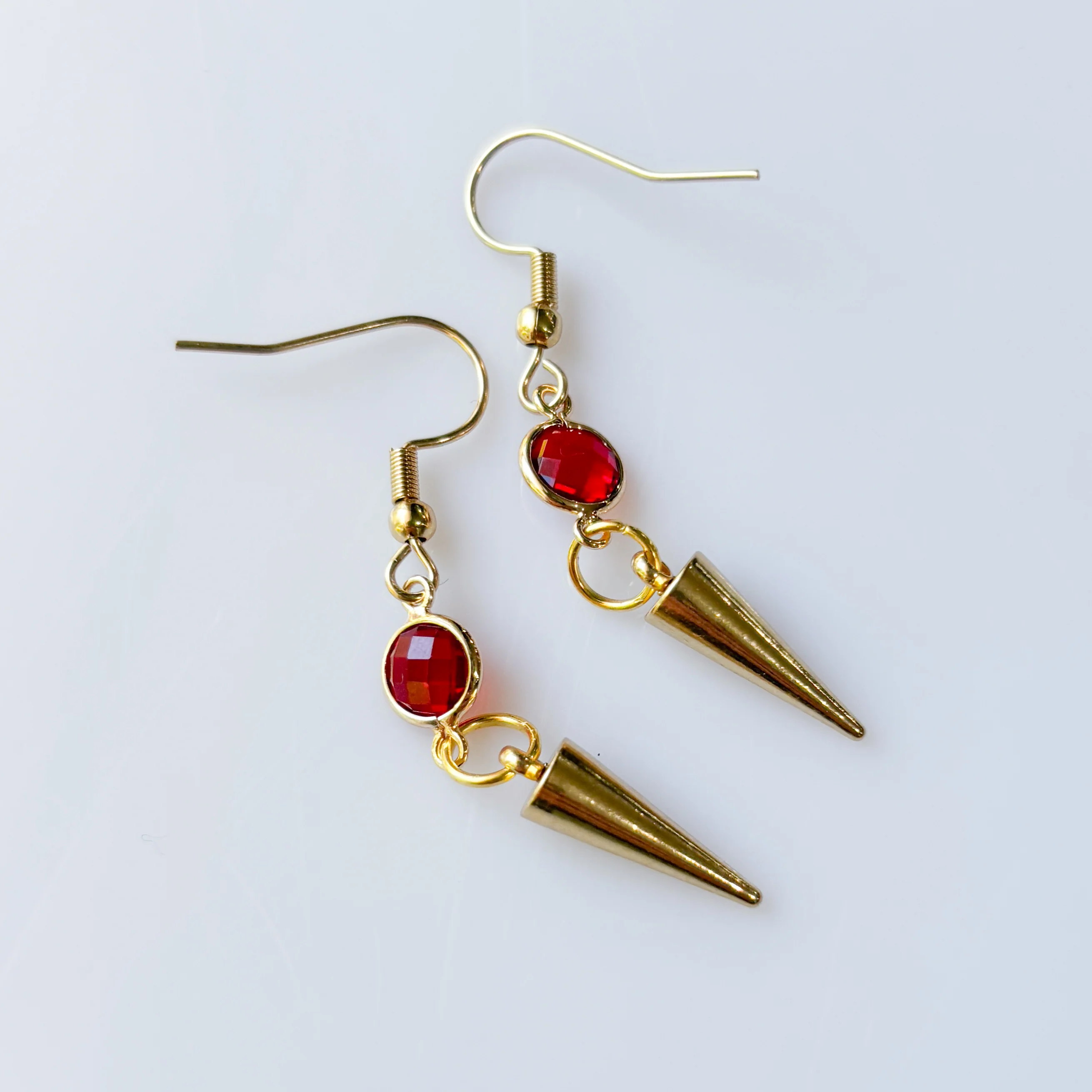 RED GEM & GOLD SPIKE CHARM EARRINGS - Image 1