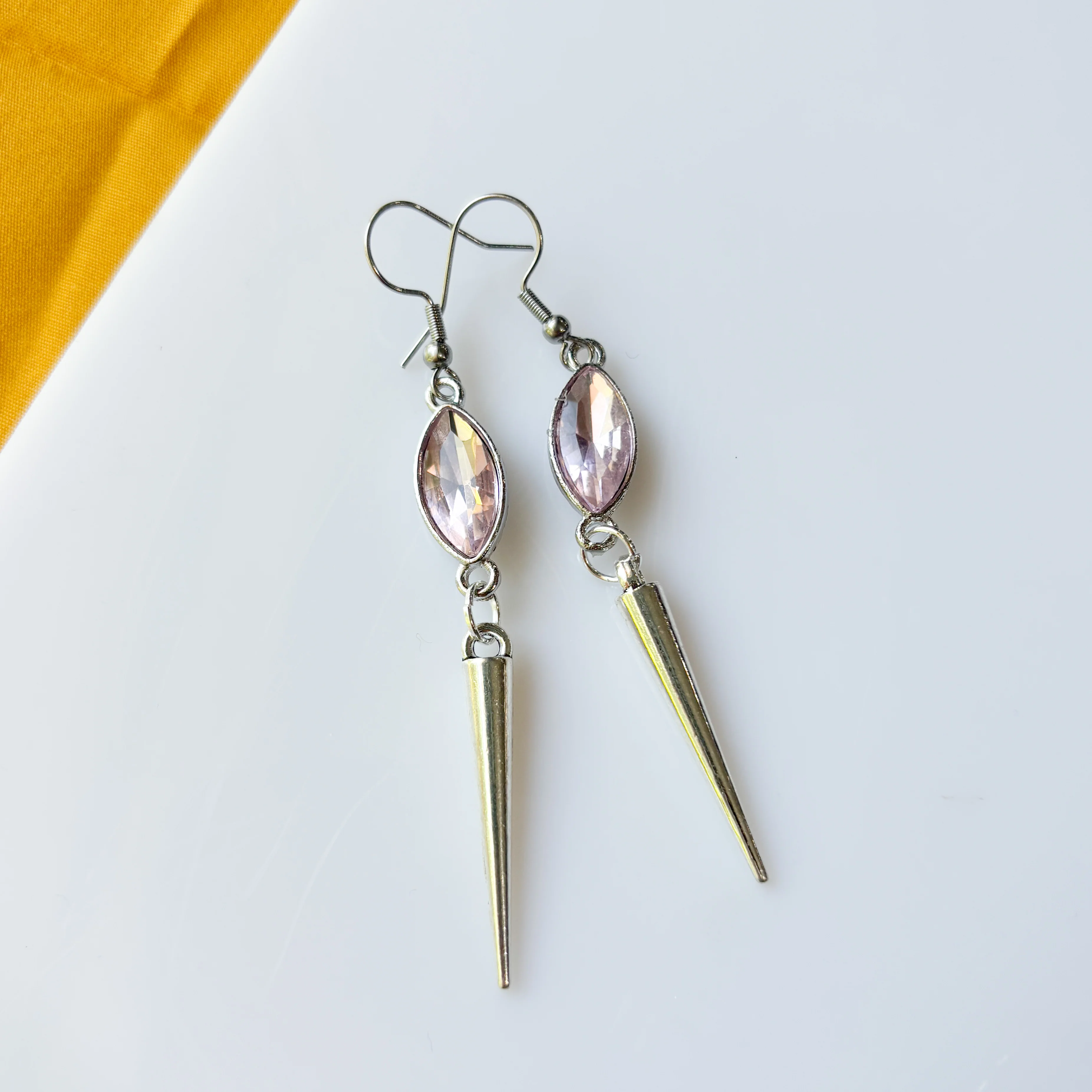 SILVER SPIKE & LIGHT PINK OVAL CHARM EARRINGS - Image 1