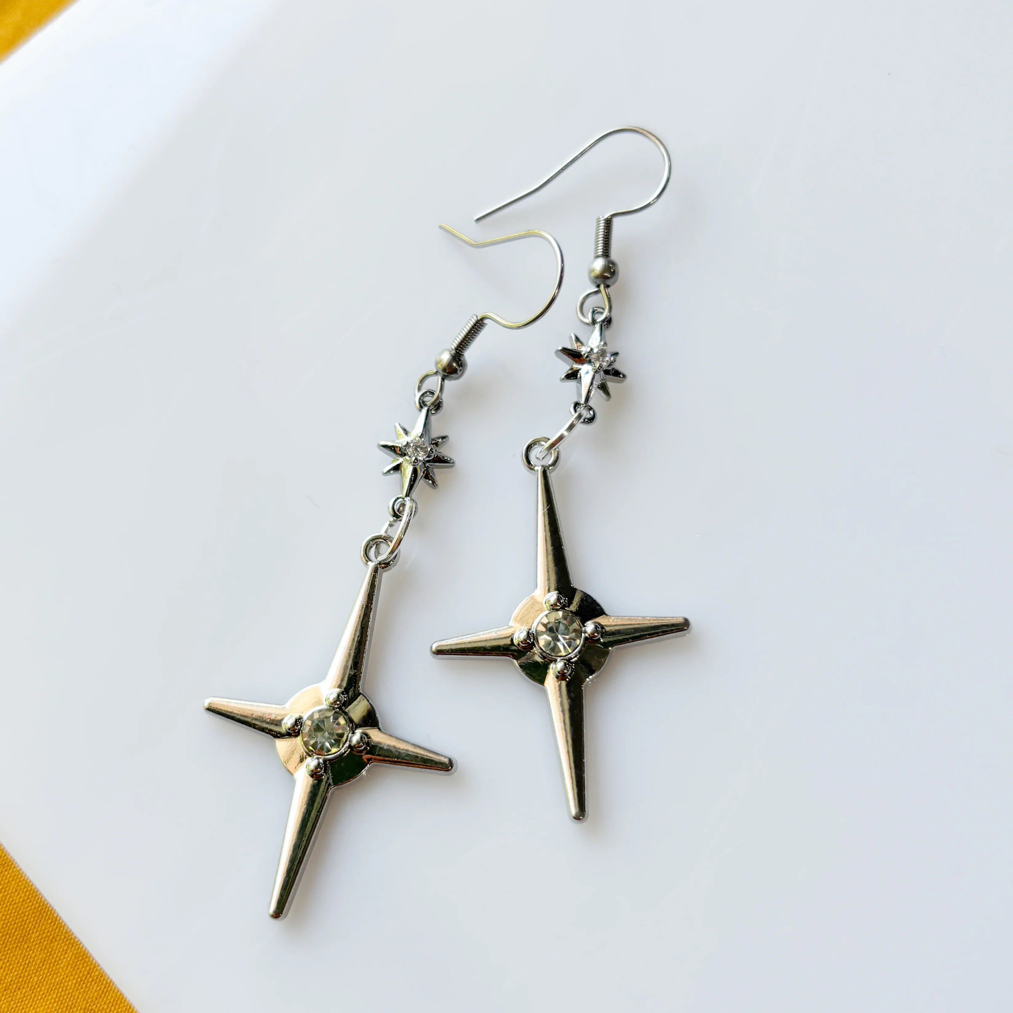 DOUBLE SILVER STAR CHARM EARRINGS - Image 1