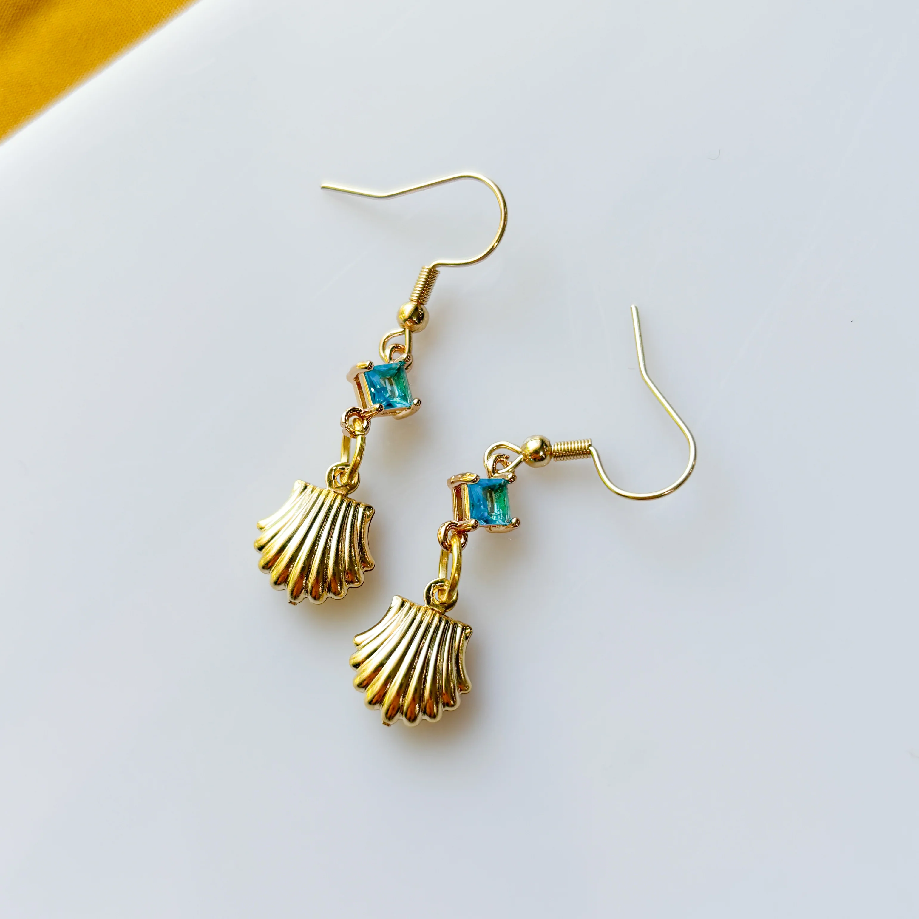 GOLD & BLUE SEASHELL CHARM EARRINGS - Image 1