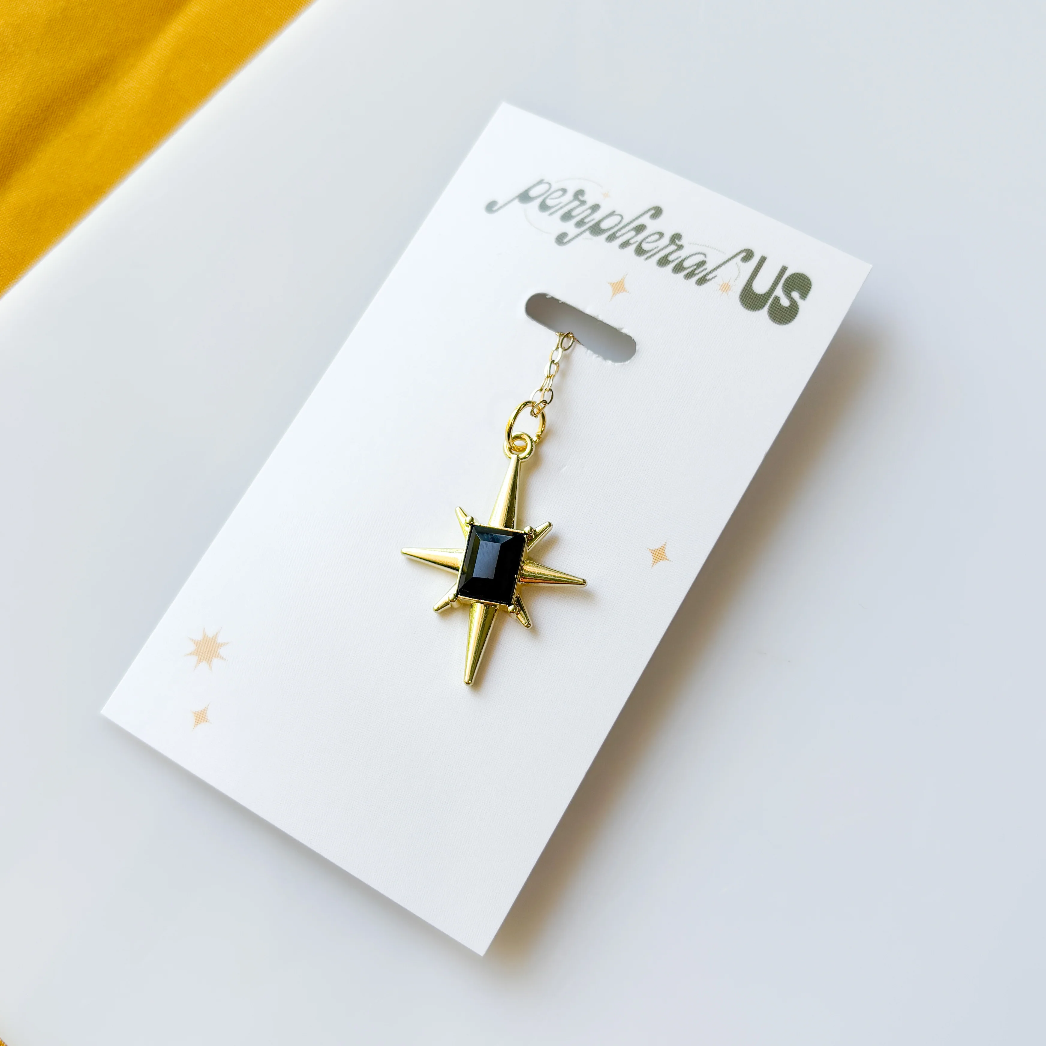 BLACK STAR CHARM NECKLACE