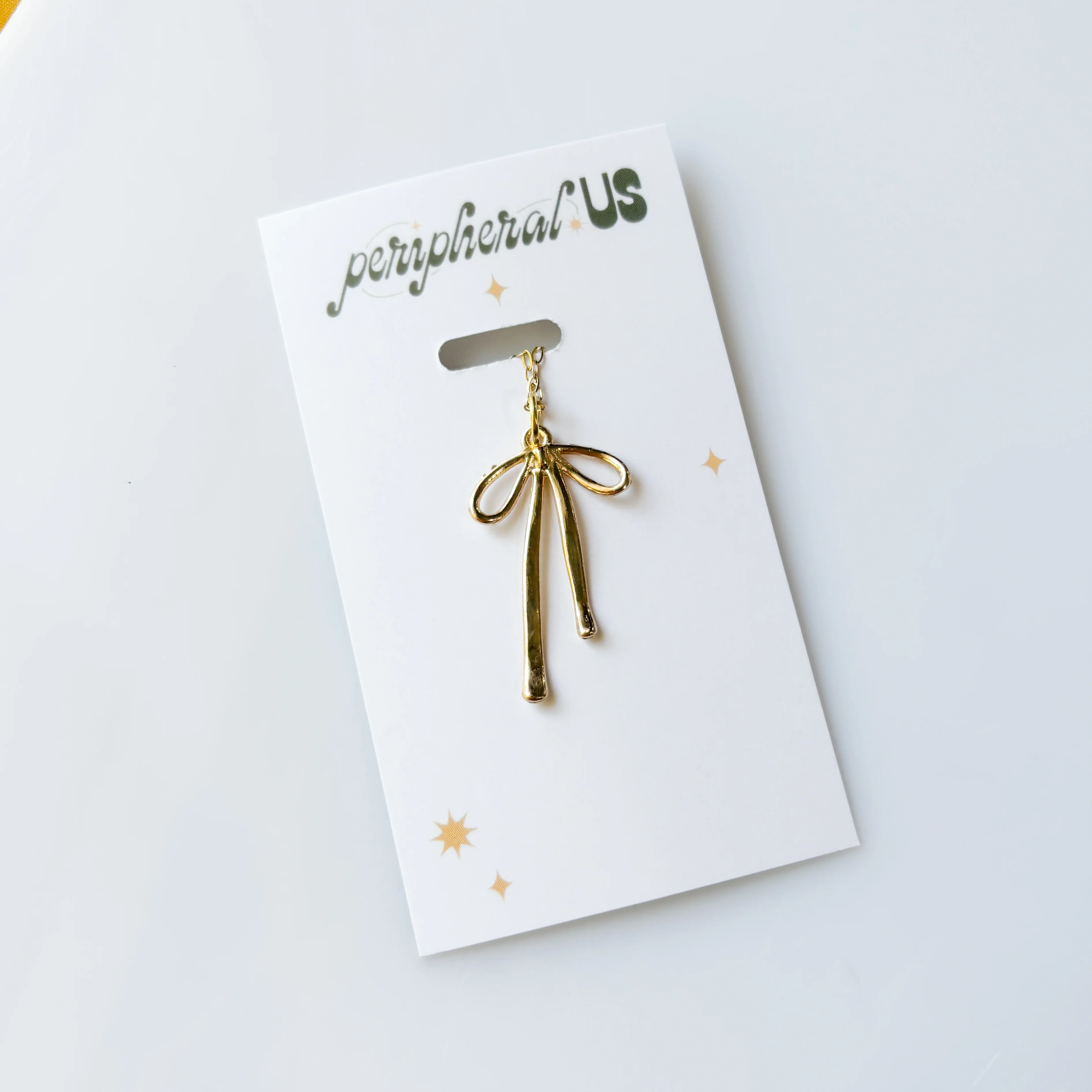 BOW CHARM NECKLACE