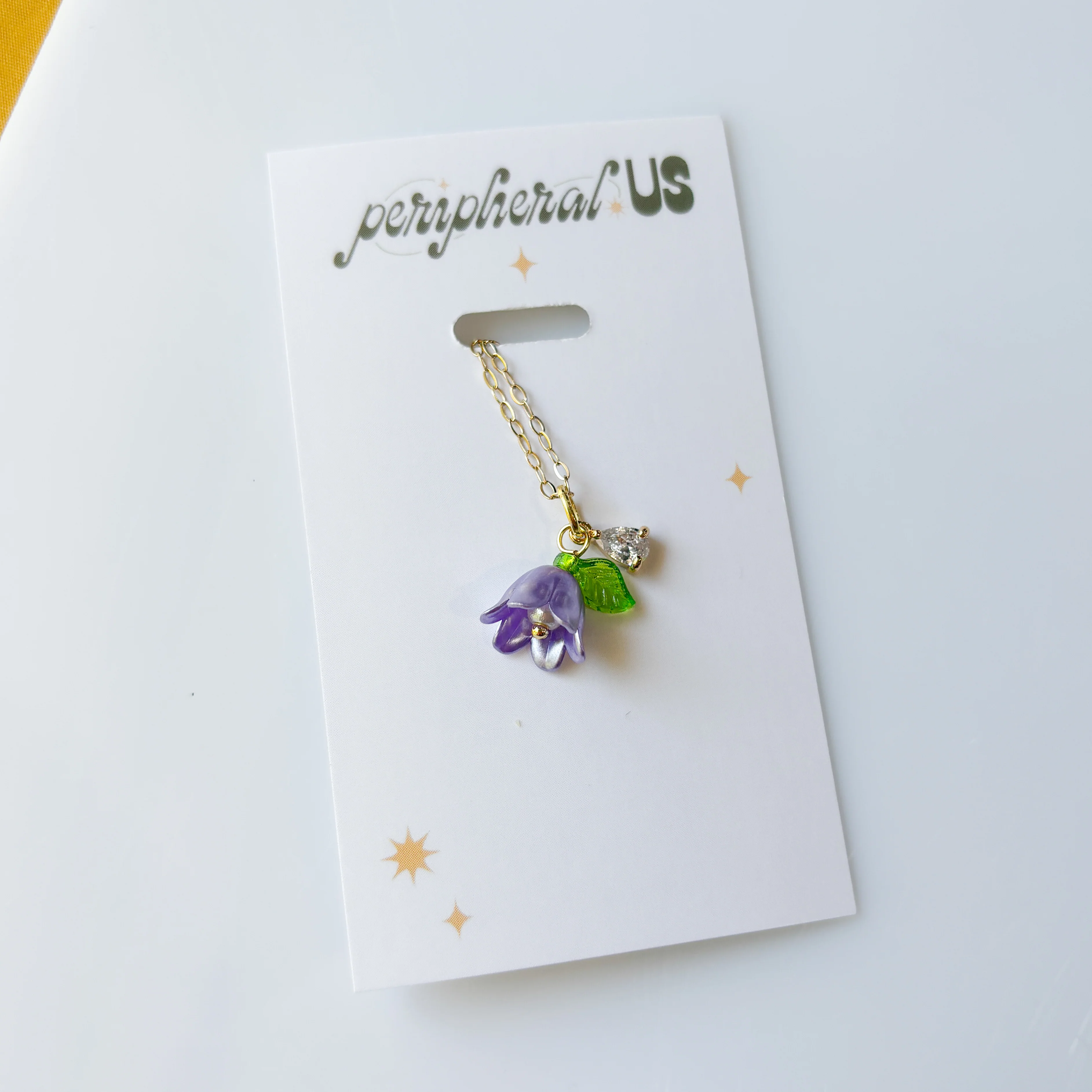 PURPLE FLOWER CHARM NECKLACE