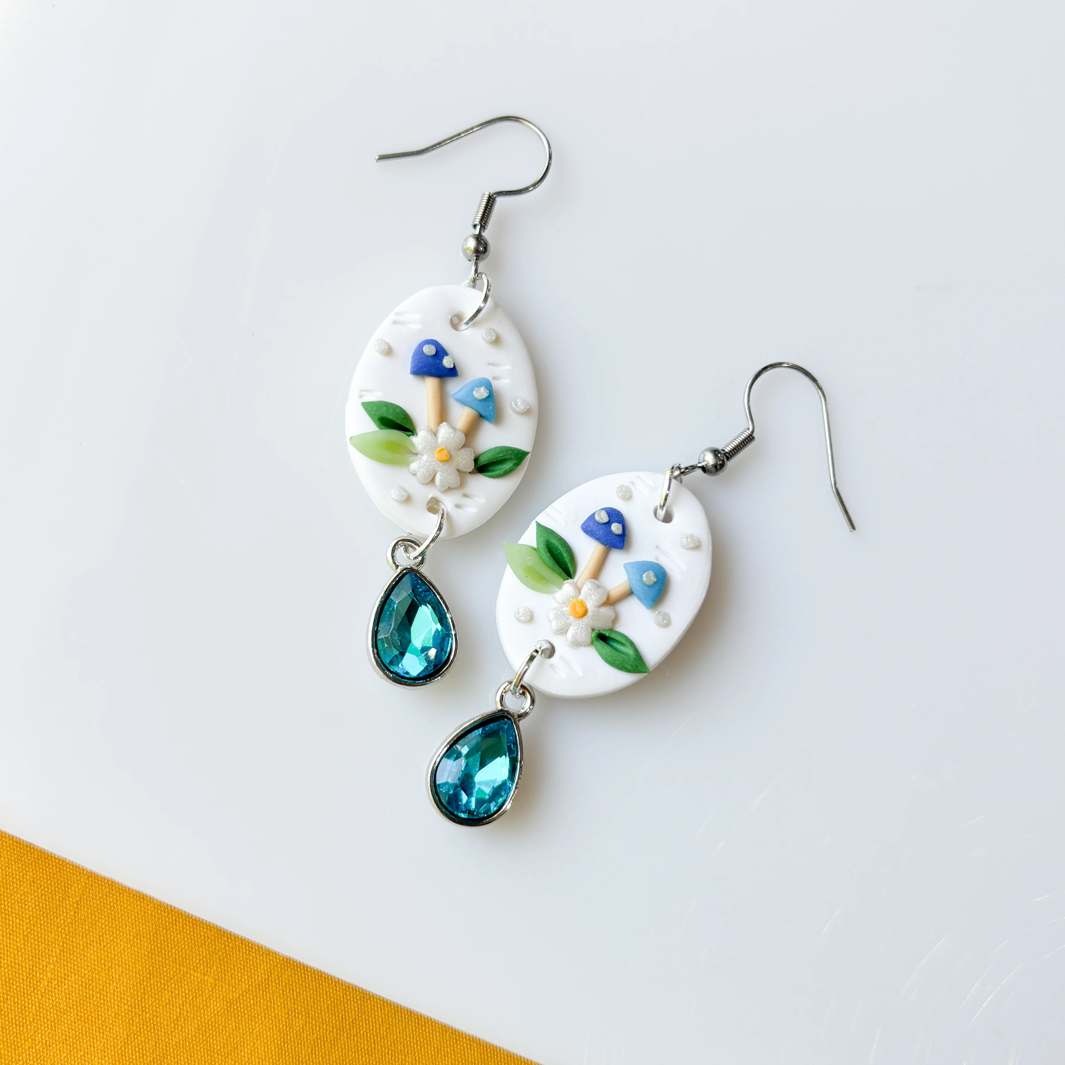 BLUE MUSHROOM OVAL EARRINGS - Image 1