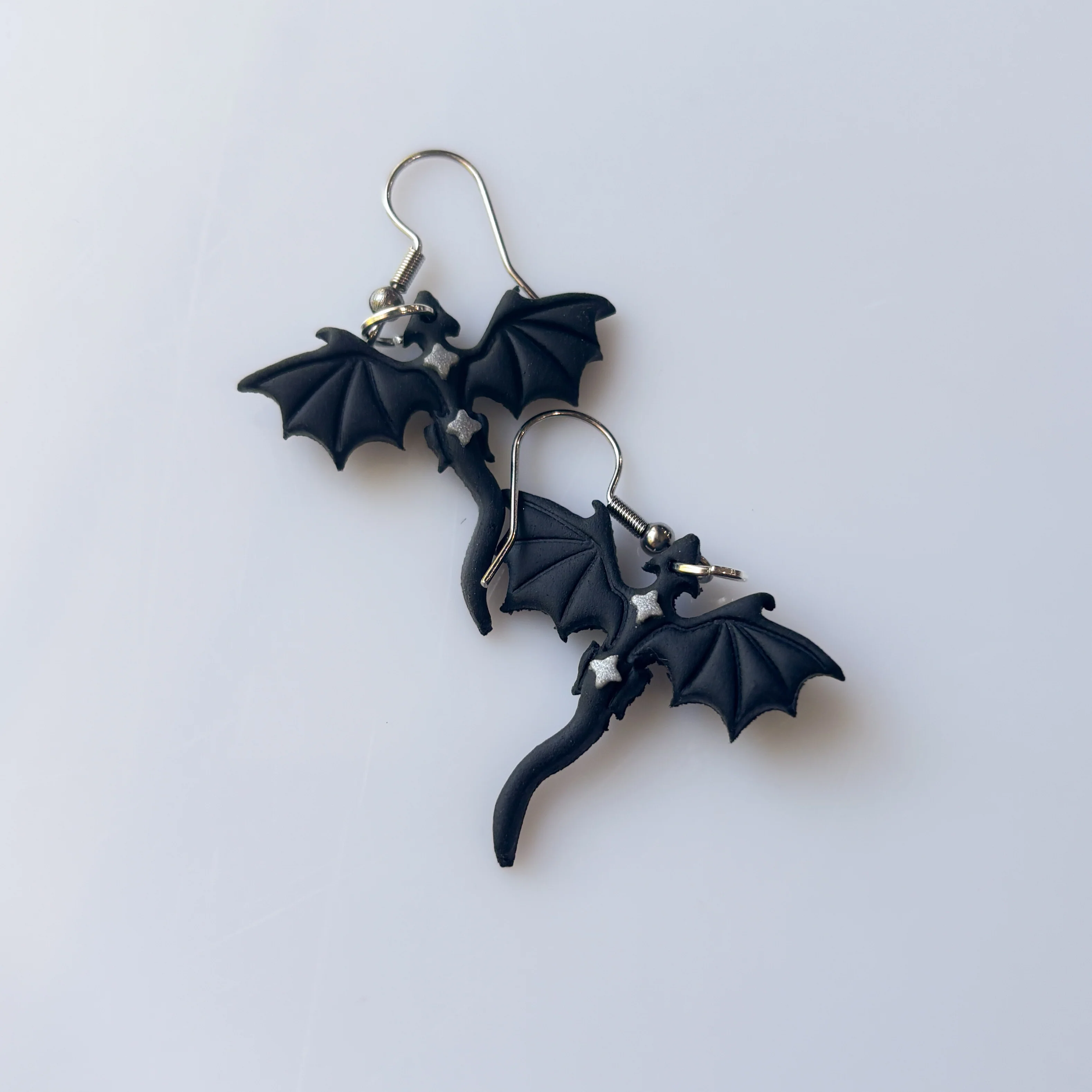 BLACK & SILVER STAR DRAGON EARRINGS (MINI) - Image 1