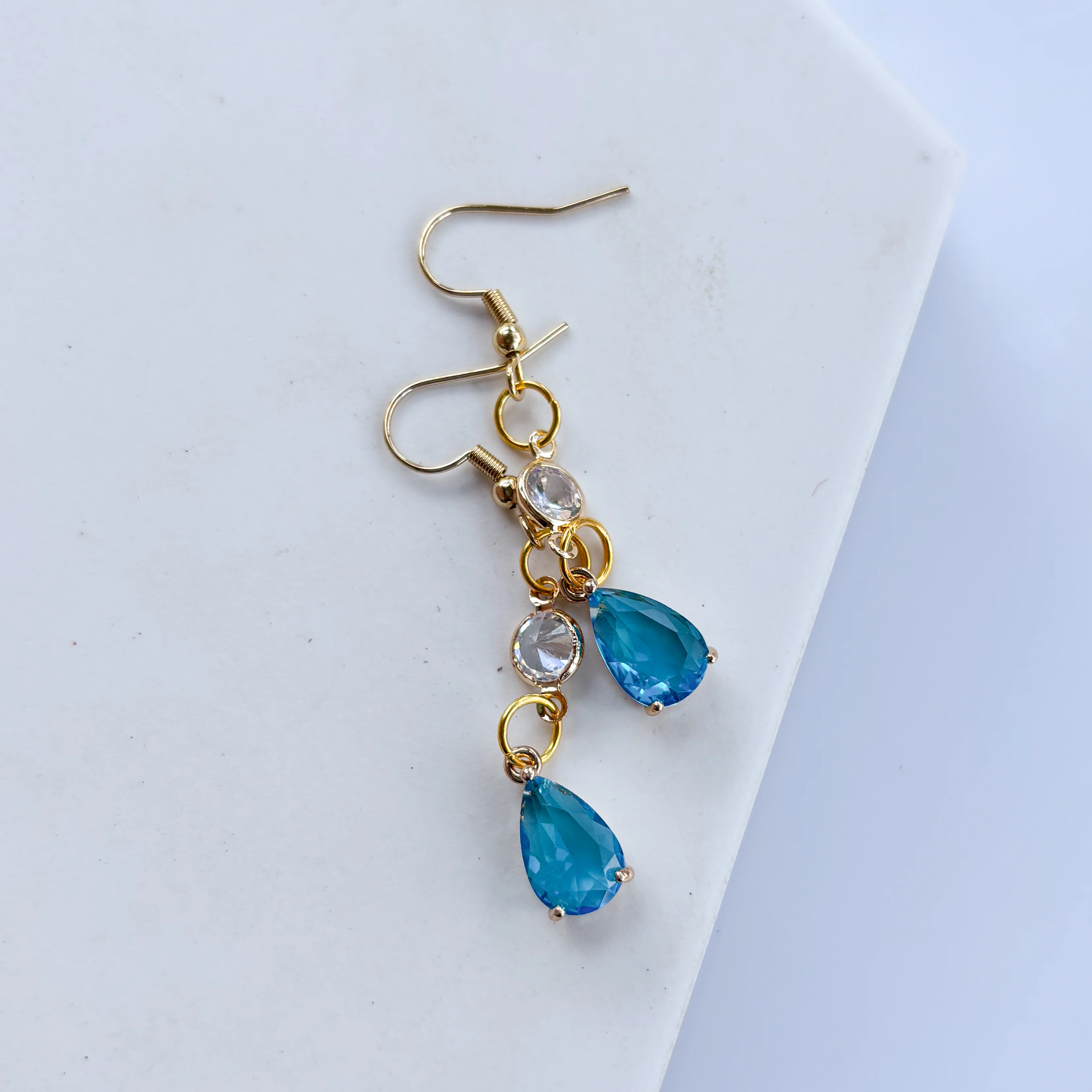 BLUE LITTLE TEARDROP GEM CHARM EARRINGS - Image 3