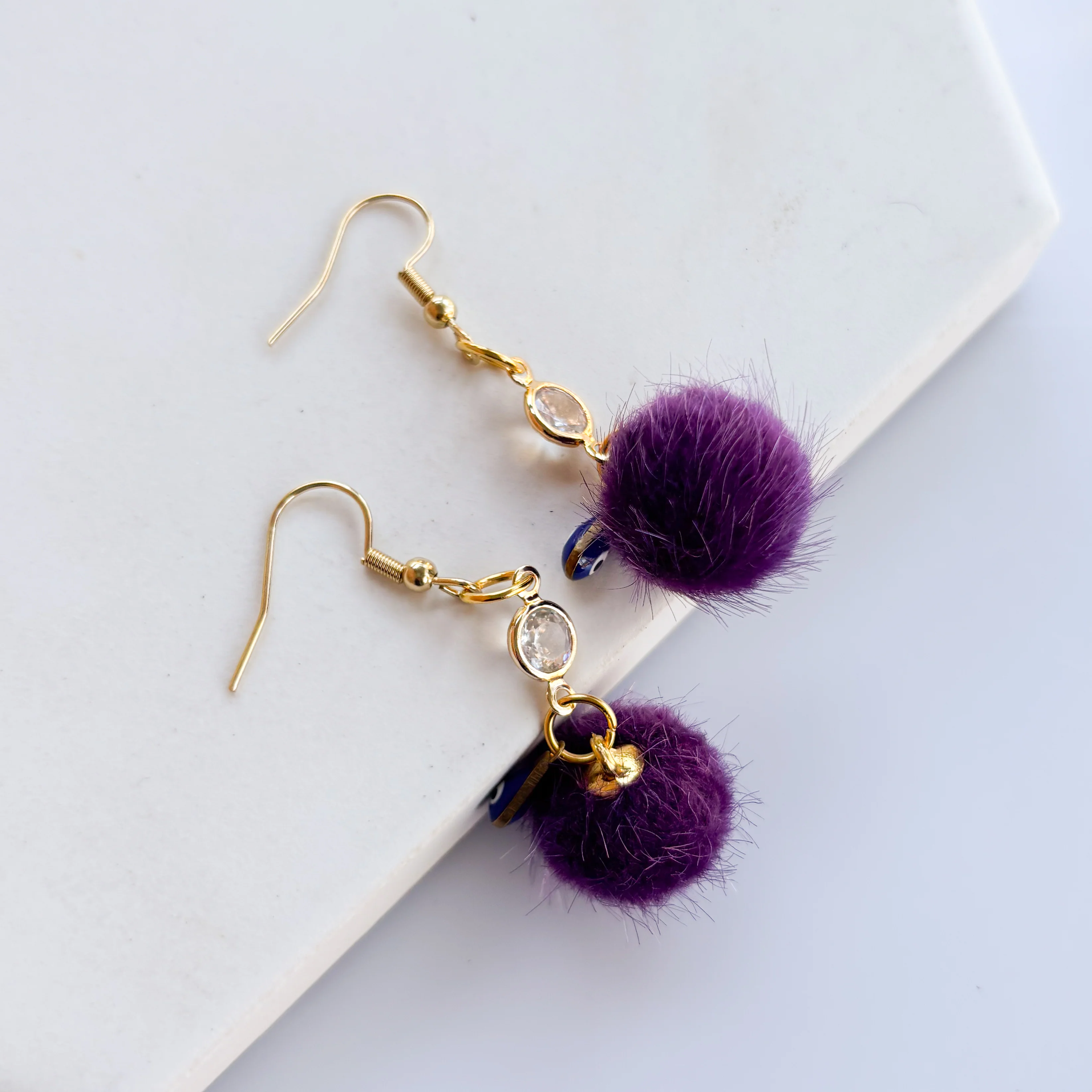 PURPLE & EVIL EYE MINI POM POM & GEM CHARM EARRINGS - Image 3