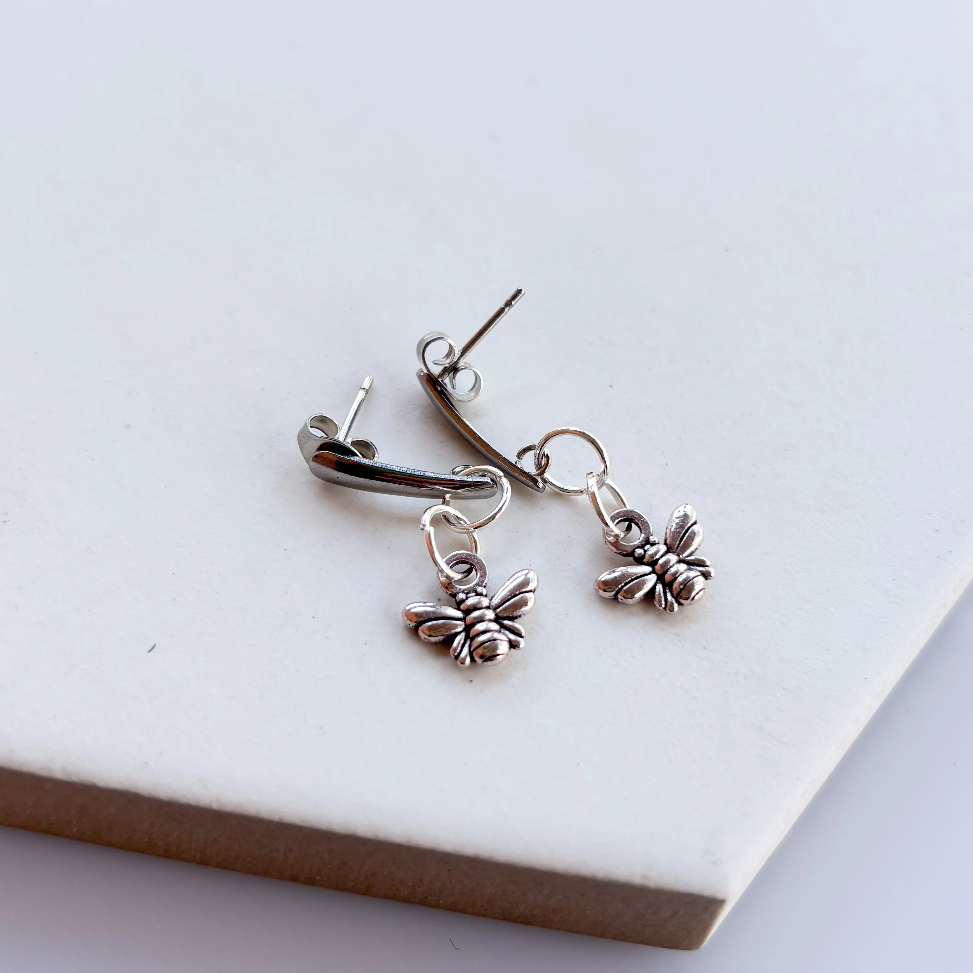 SILVER BEE STUD CHARM EARRINGS - Image 2