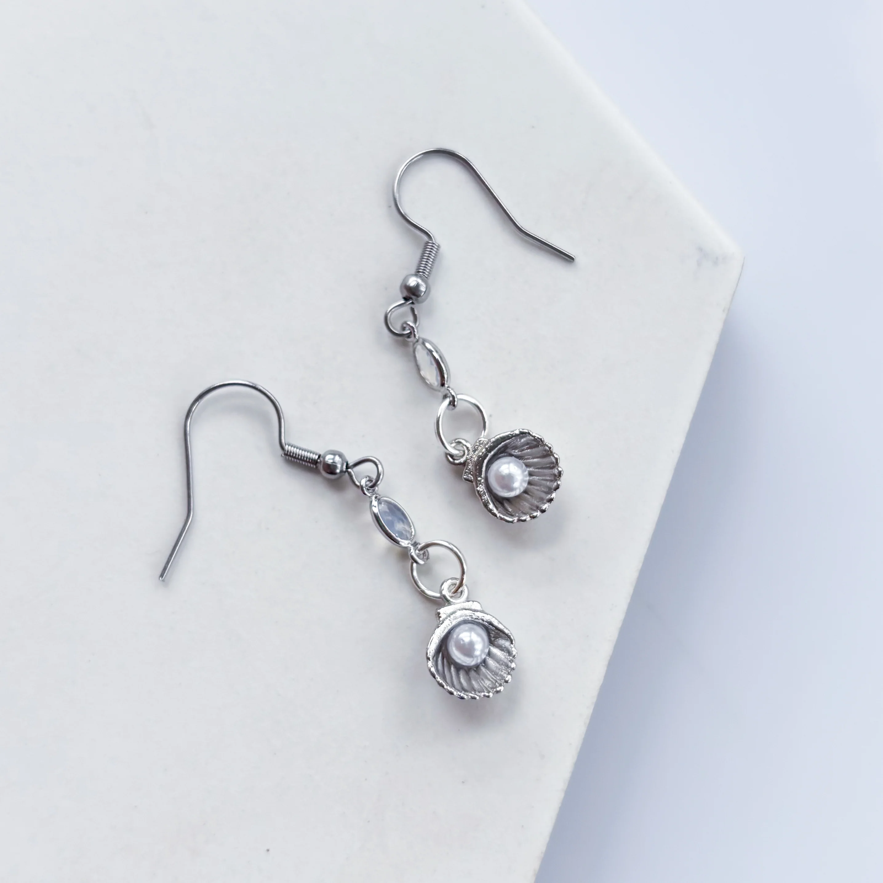 SILVER SEASHELL CHARM EARRINGS - Image 2