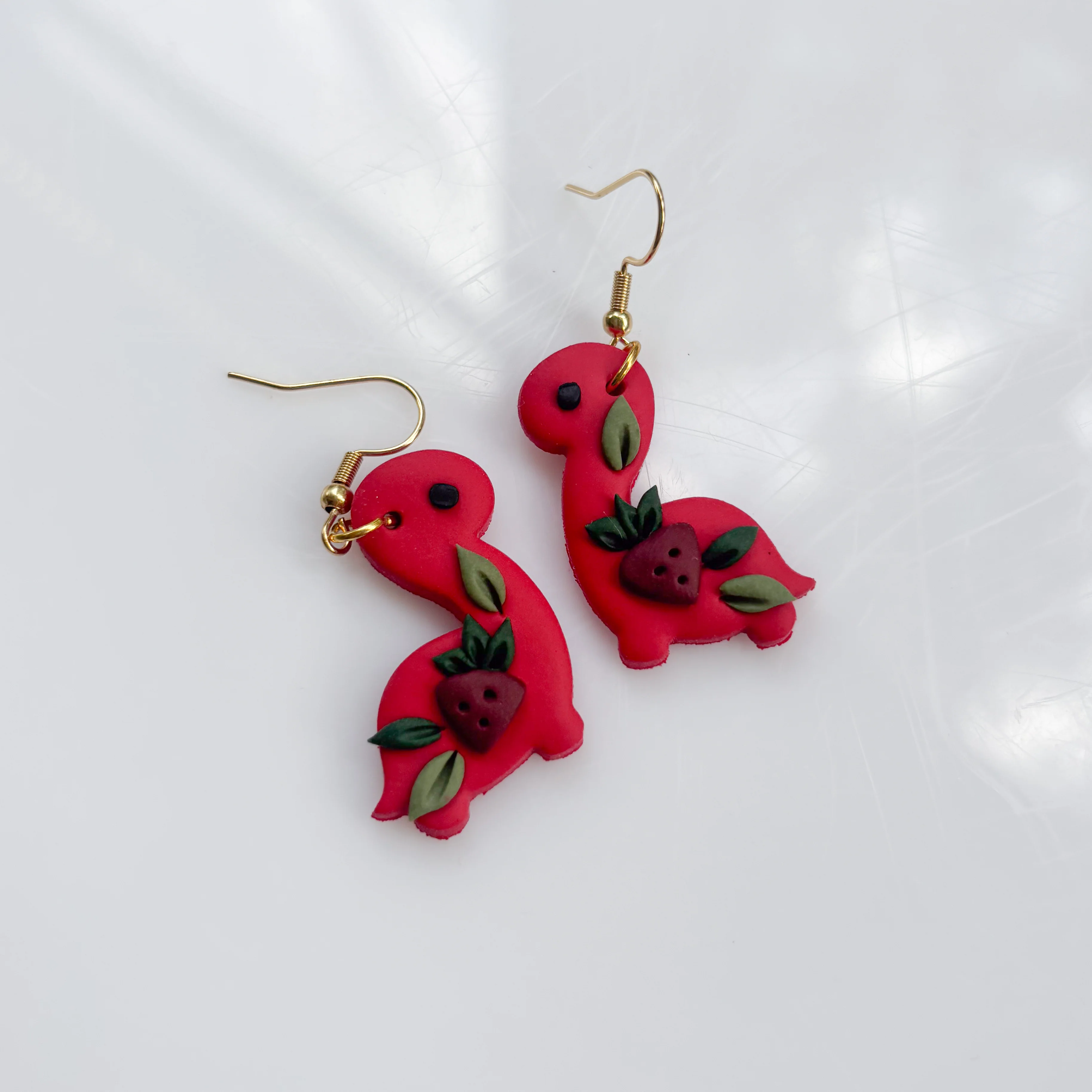 RED STRAWBERRY DINO EARRINGS (BRONTO) - Image 2