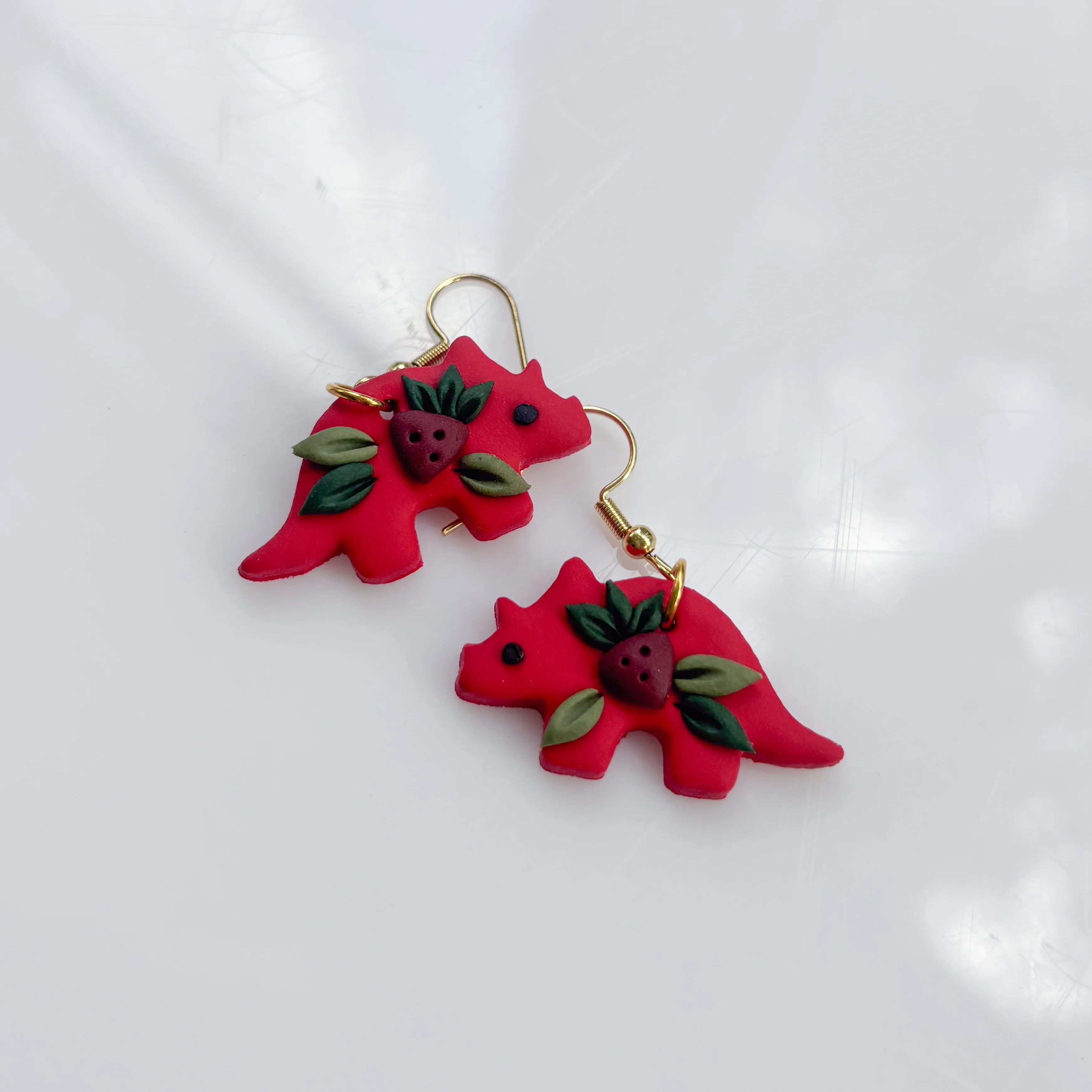 RED STRAWBERRY DINO EARRINGS (TRICERATOPS) - Image 2