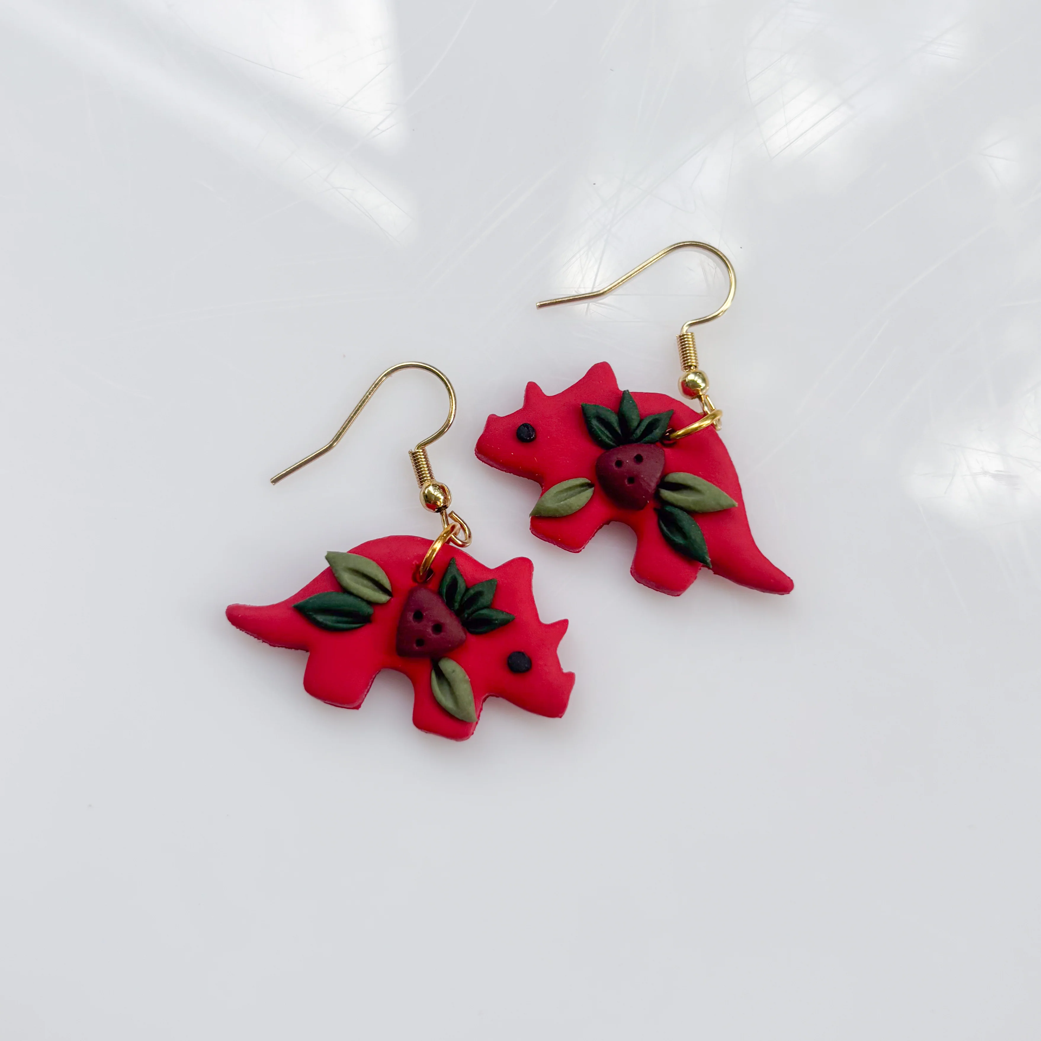 RED STRAWBERRY DINO EARRINGS (TRICERATOPS) - Image 3