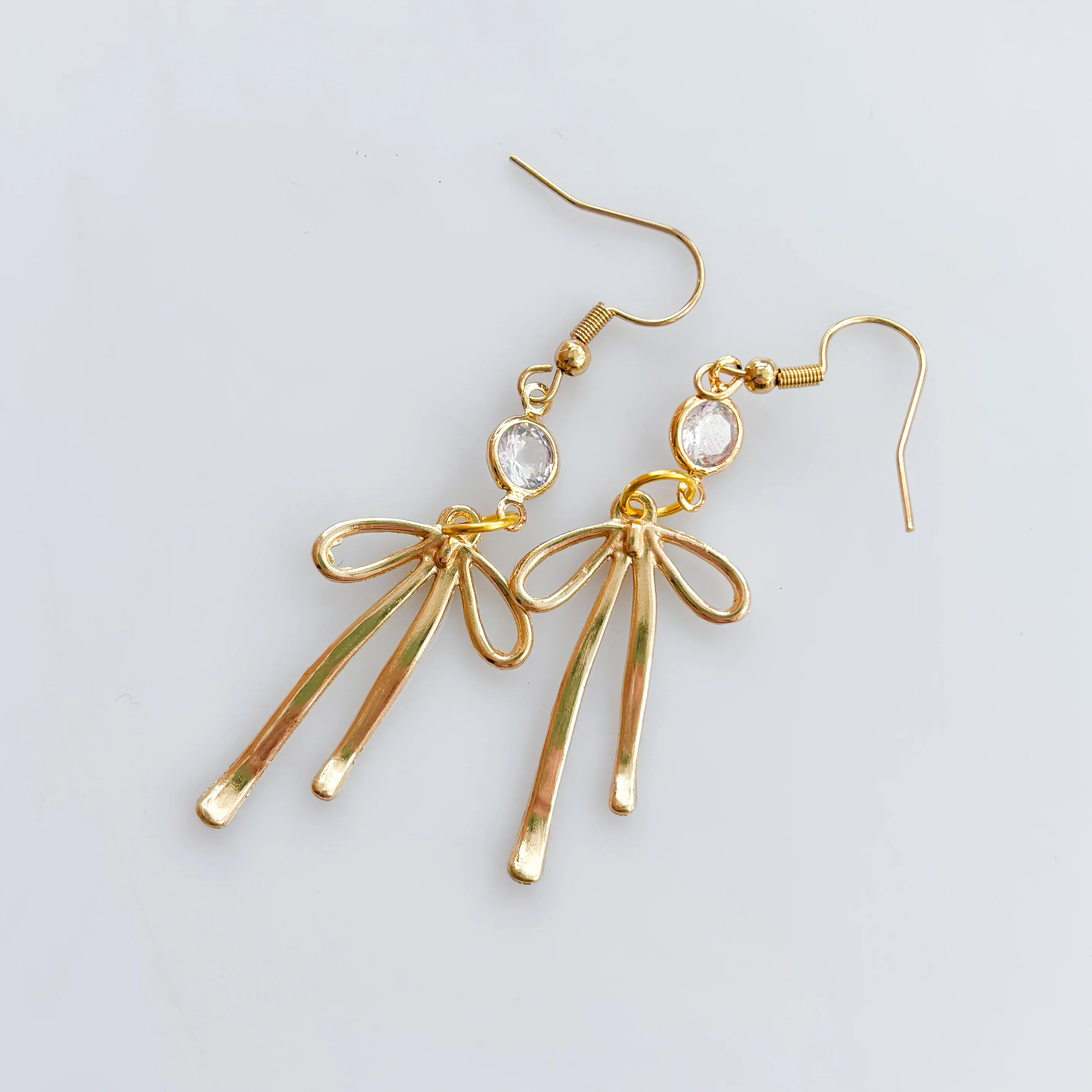 LONG GOLD BOW & GEM CHARM EARRINGS - Image 2