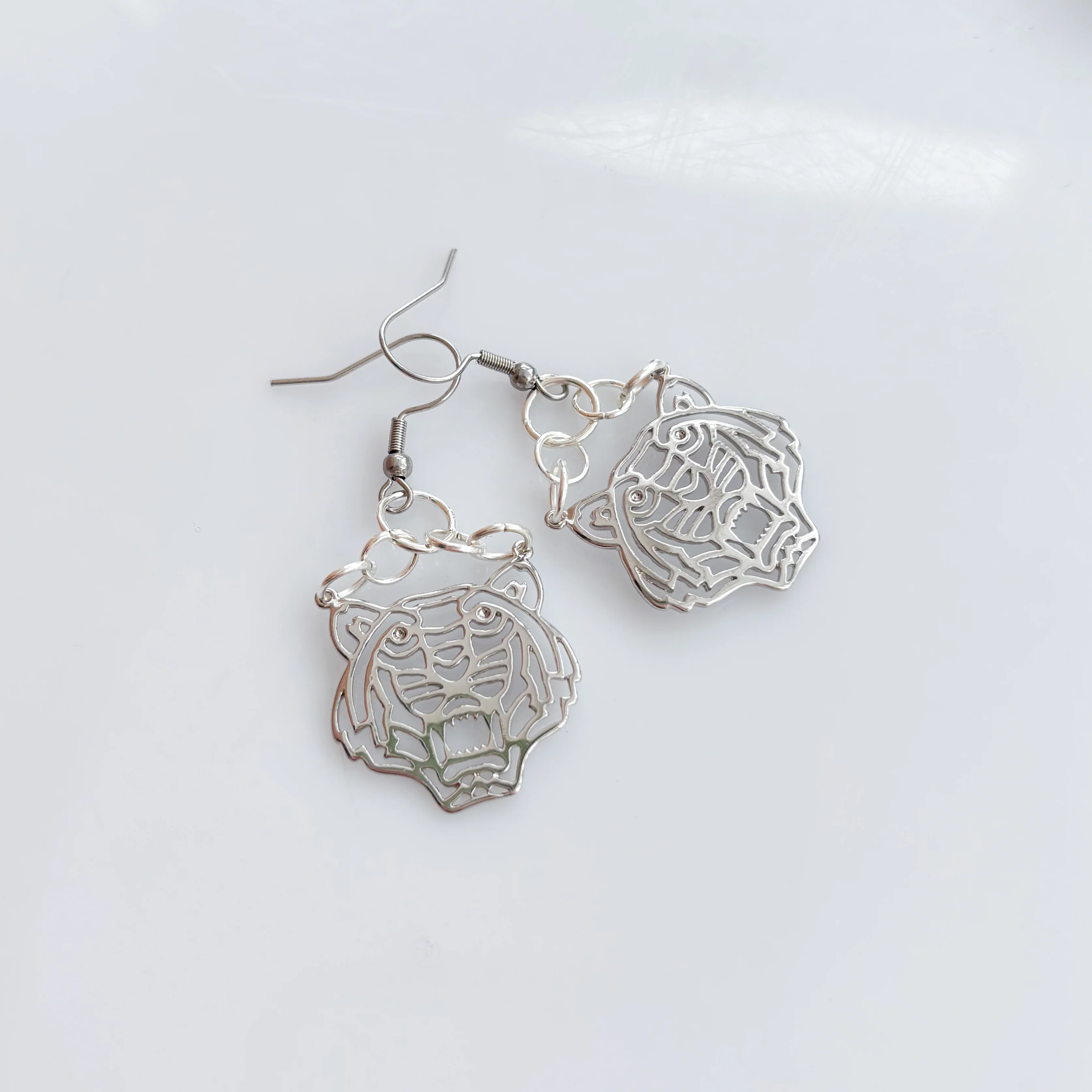 SILVER TIGER CHARM EARRINGS