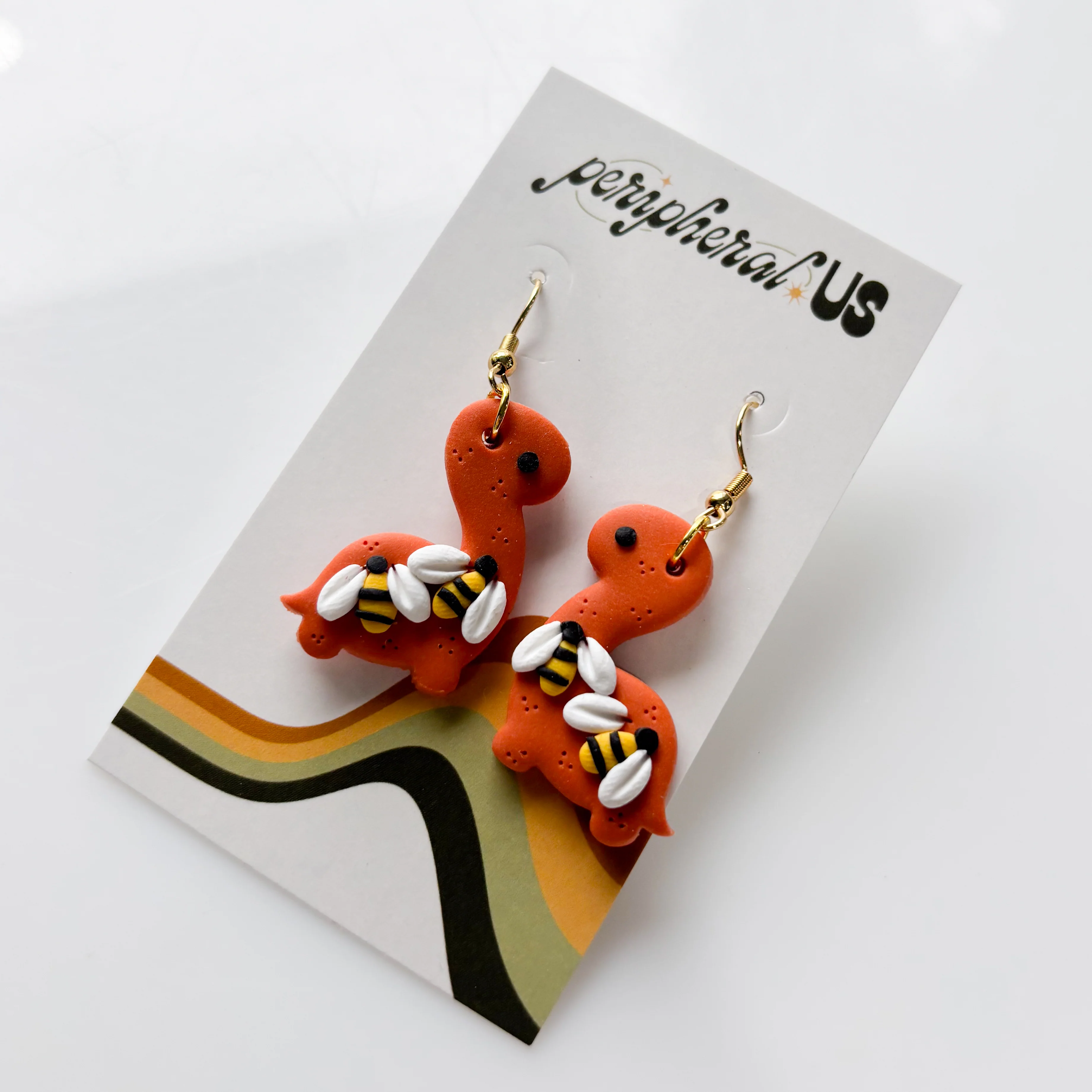 ORANGE BEE BRONTO DINO EARRINGS
