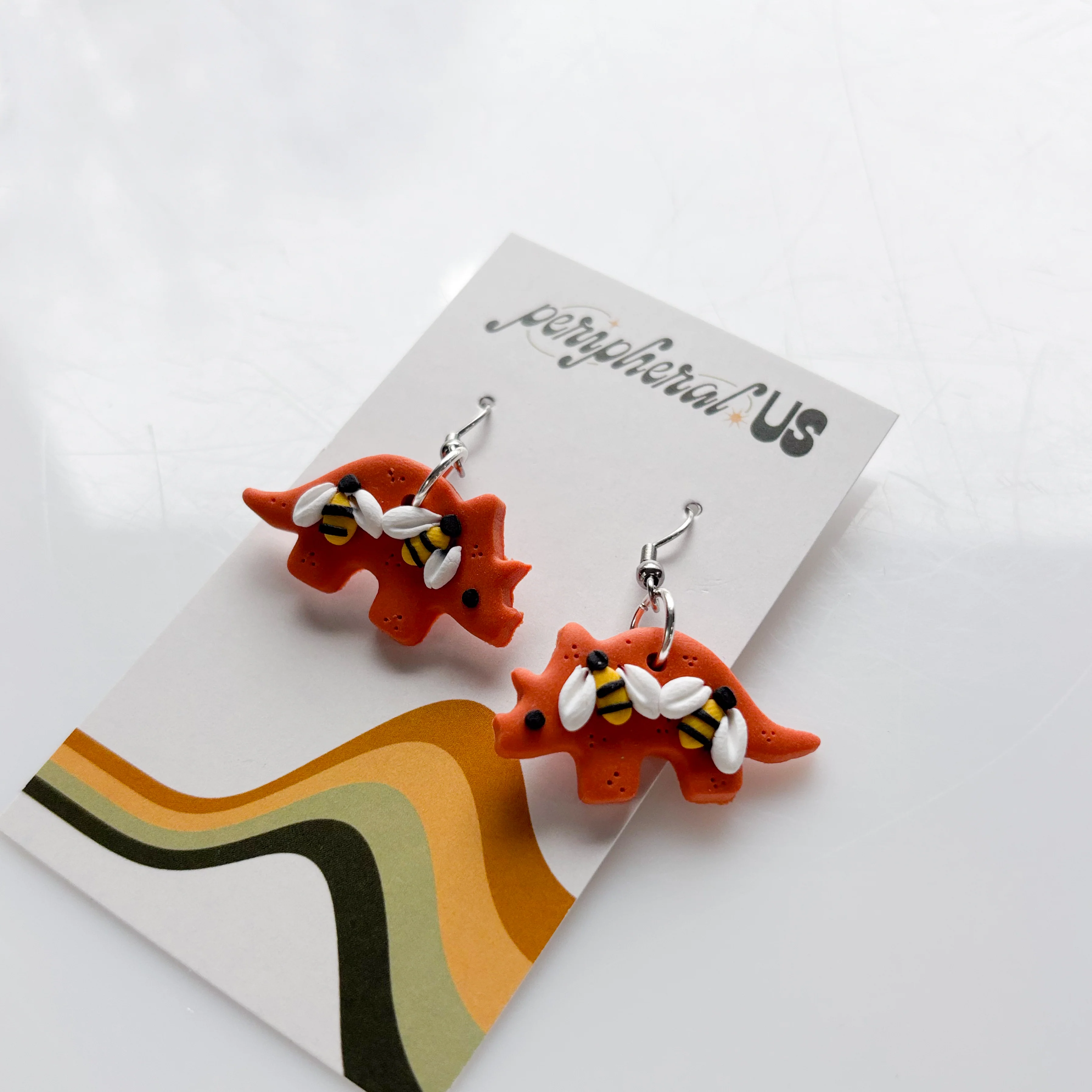 ORANGE BEE TRICERATOPS EARRINGS - Image 3