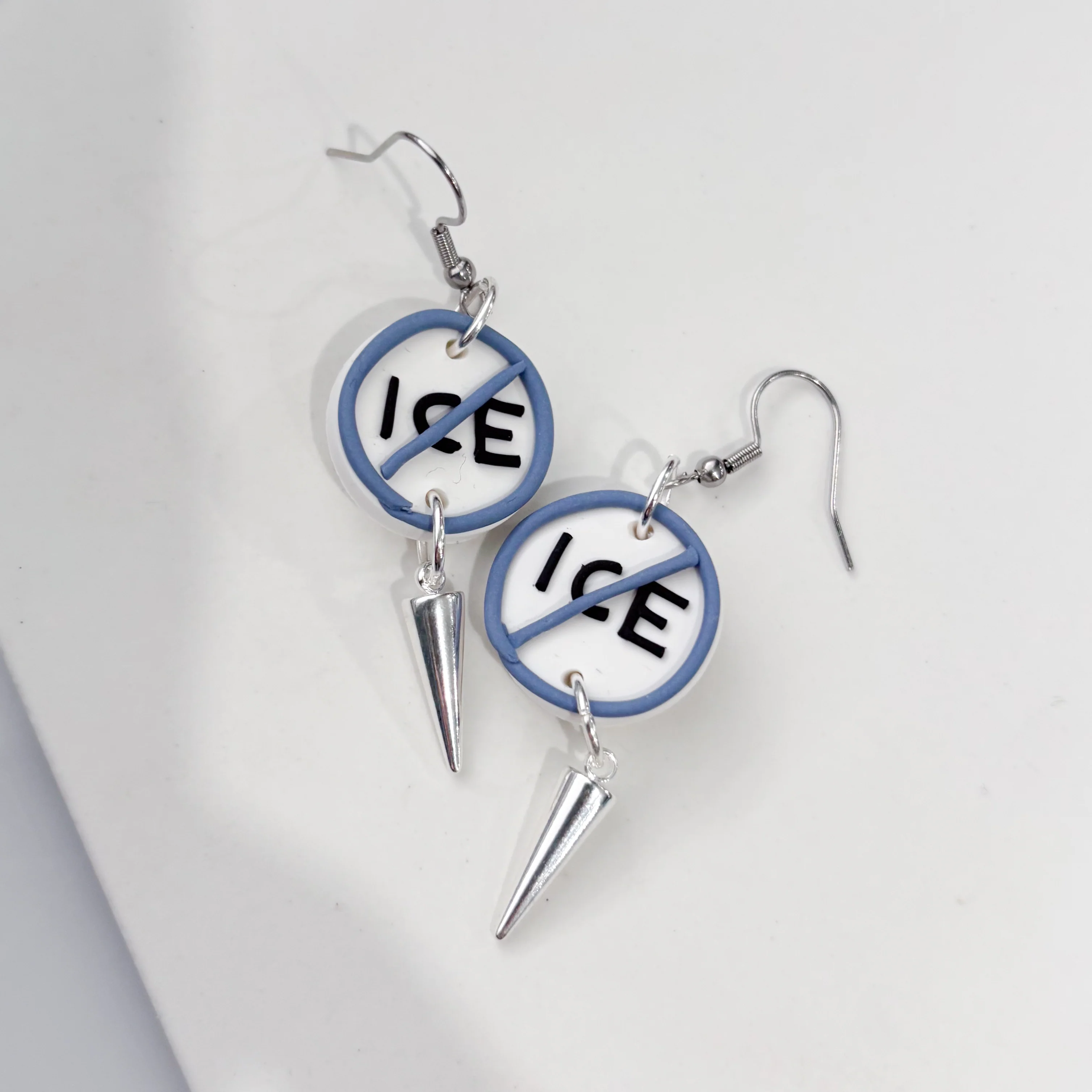 ICE OUT BLUE CIRCLE EARRINGS