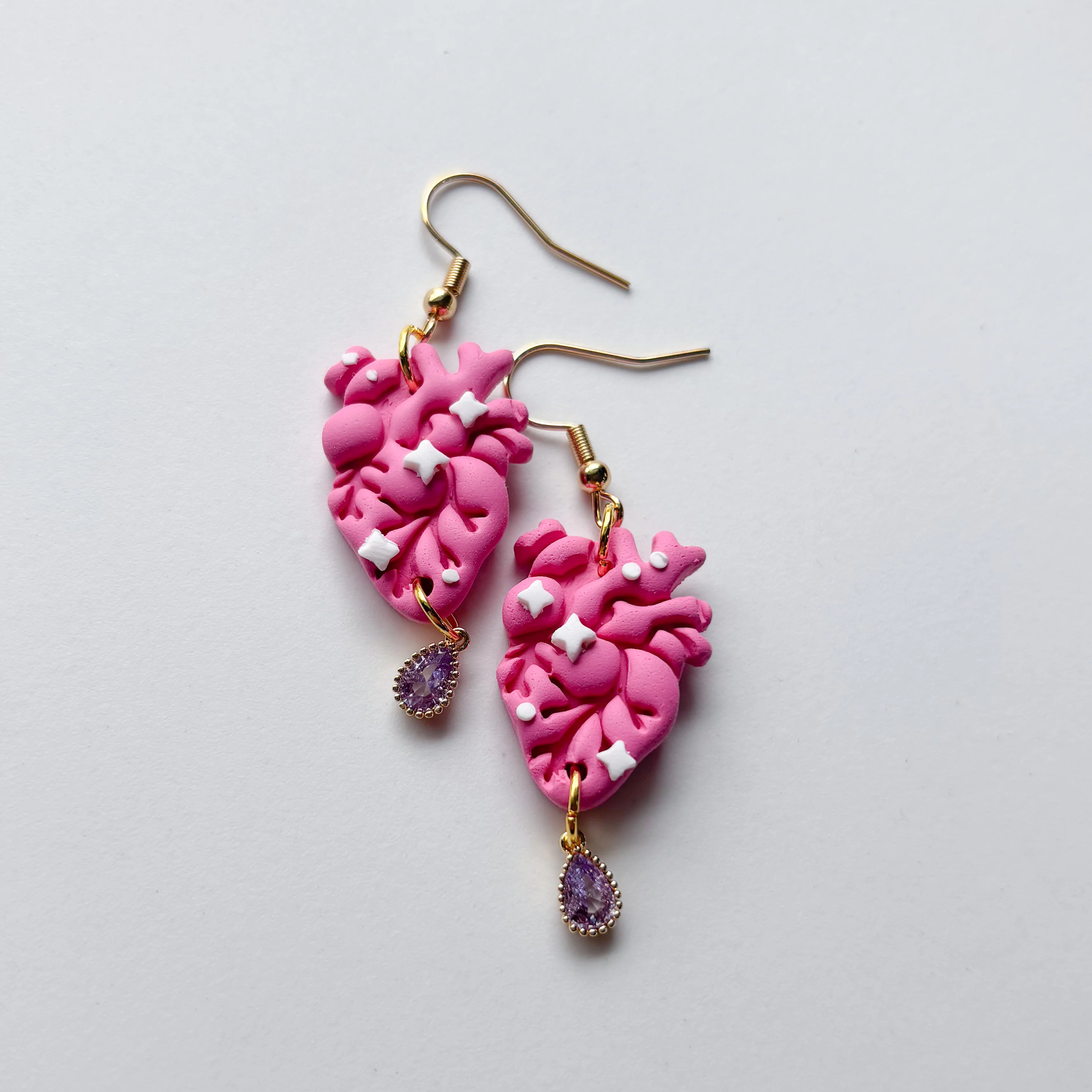 PINK SPARKLE ANATOMICAL HEART EARRINGS - Image 2