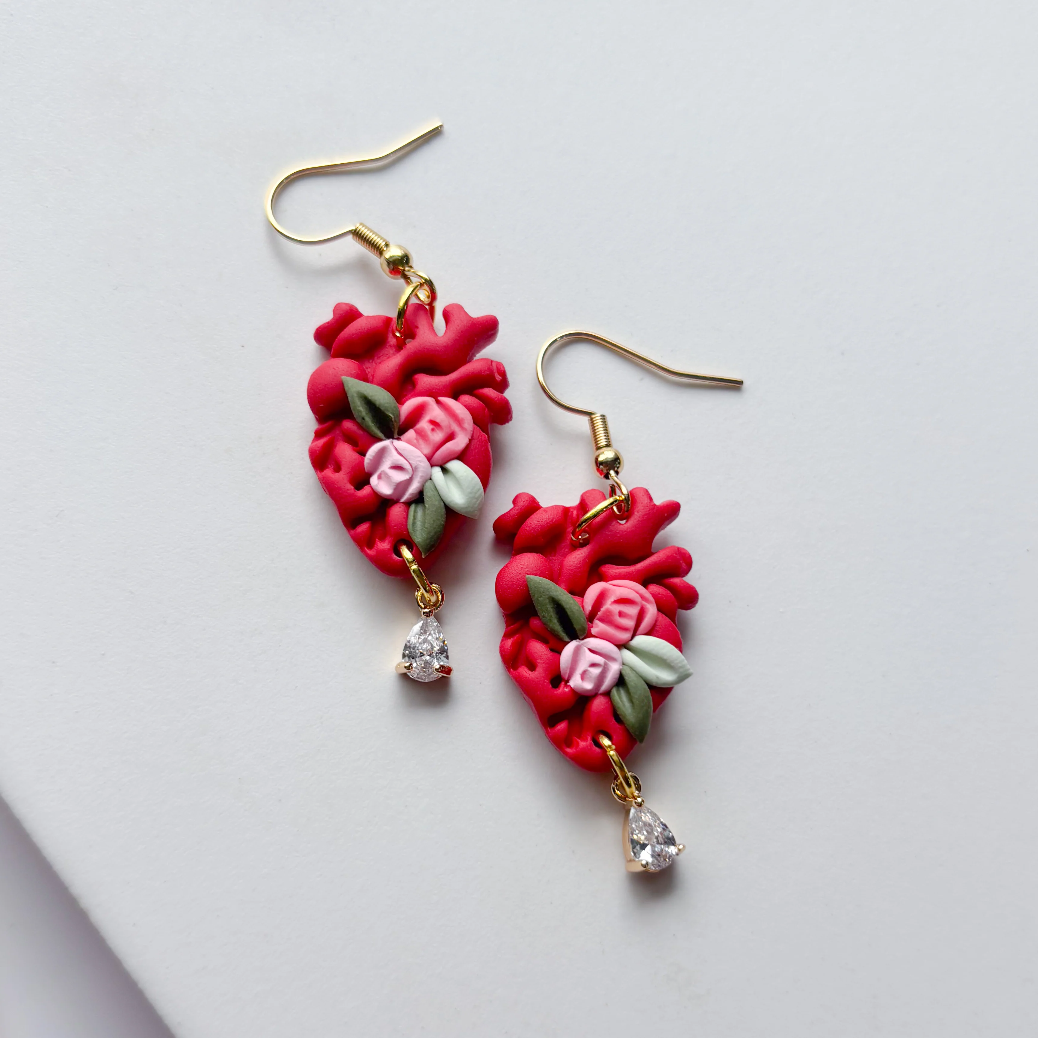 RED FLORAL ANATOMICAL HEART EARRINGS - Image 1