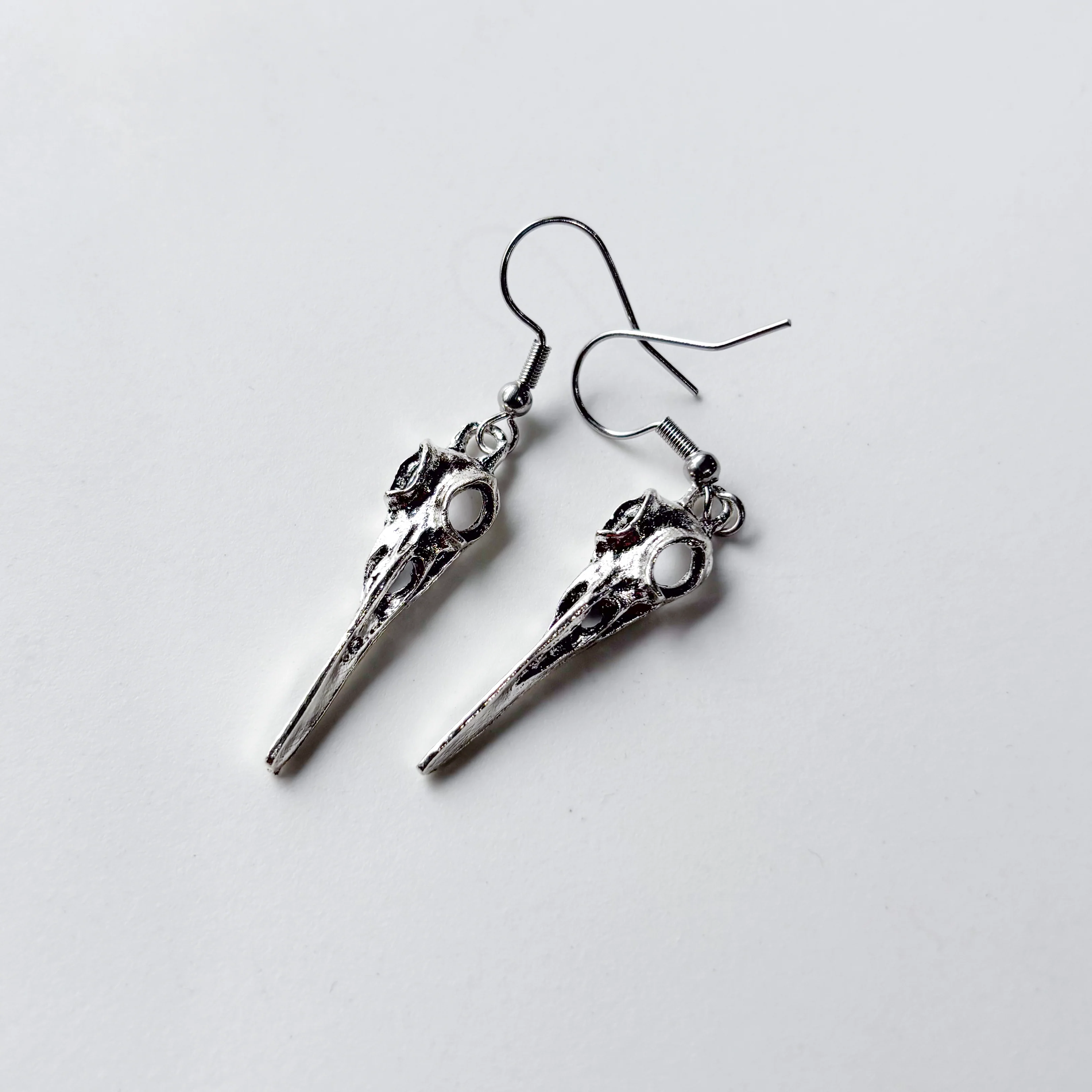 SILVER SKULL CHARM EARRINGS - Image 2